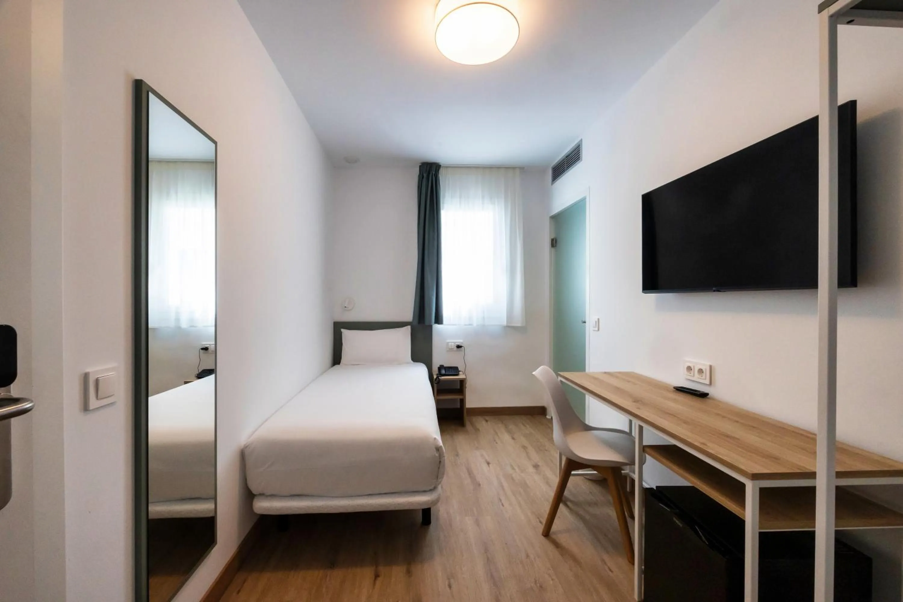 Bed in Hotel Calella by Beatriz Hoteles