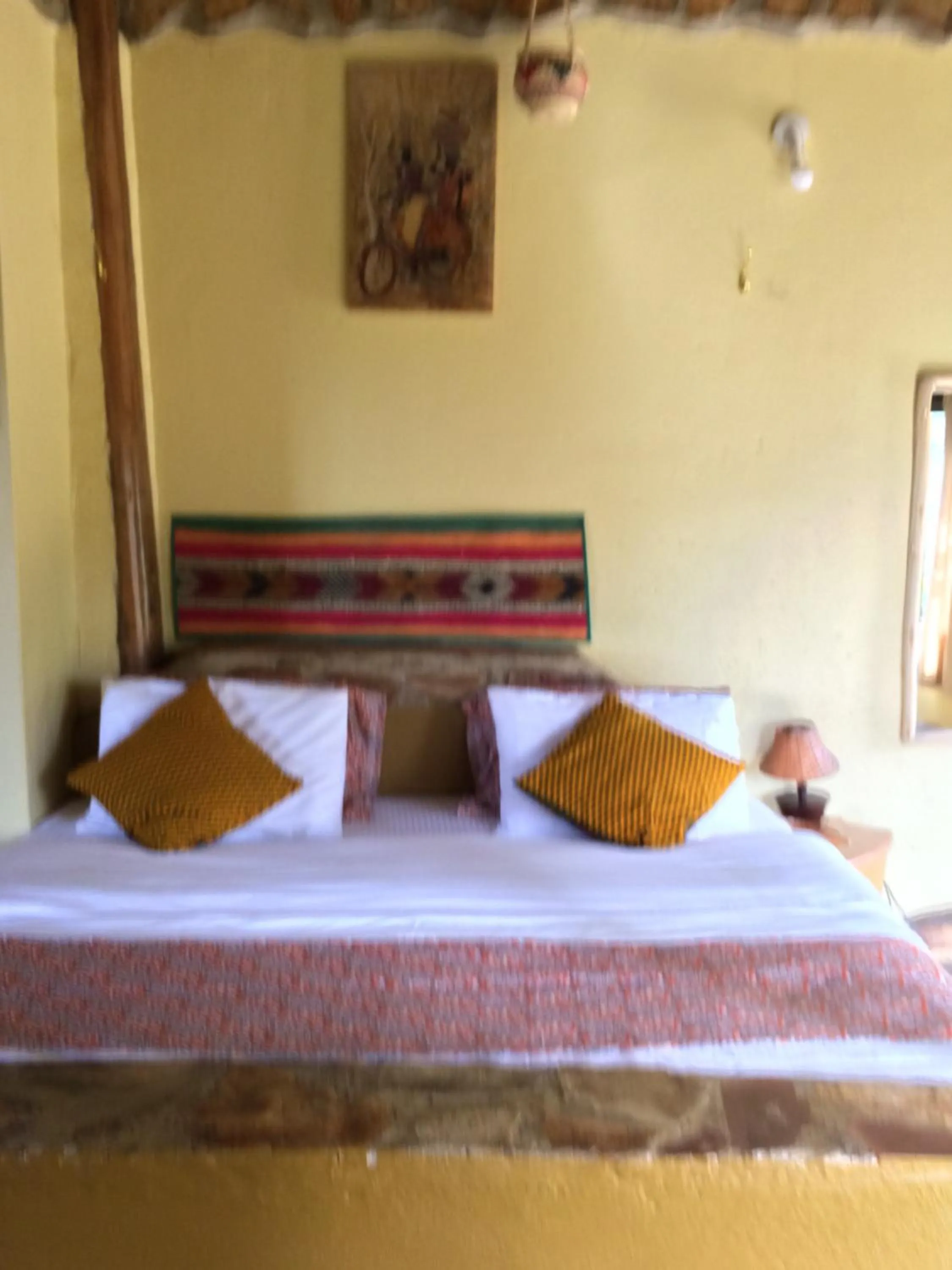 Bed in Nyore Hillside Retreat