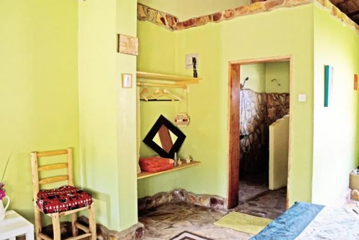 Bedroom in Nyore Hillside Retreat