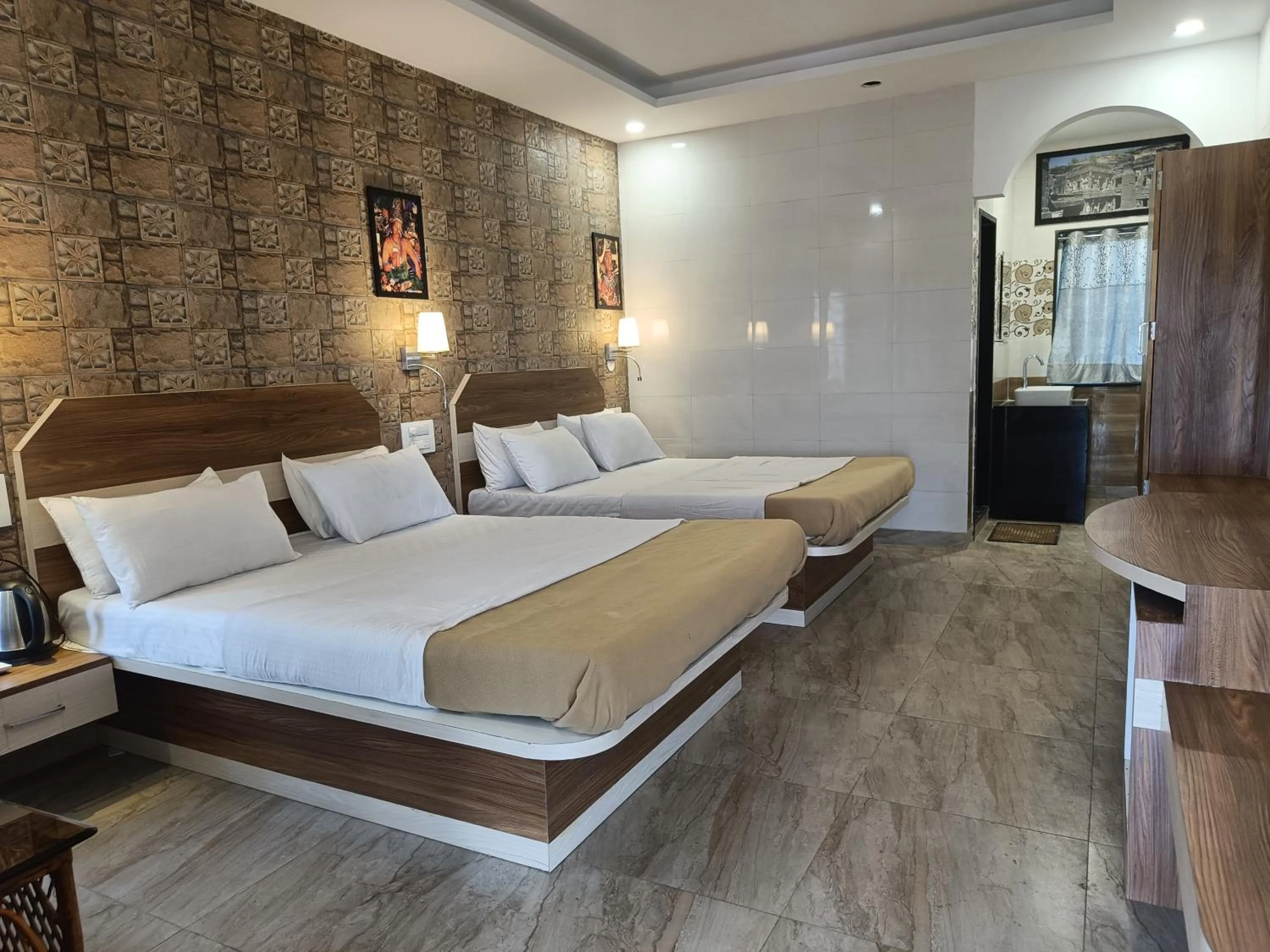 Bed in Ellora Heritage Resort