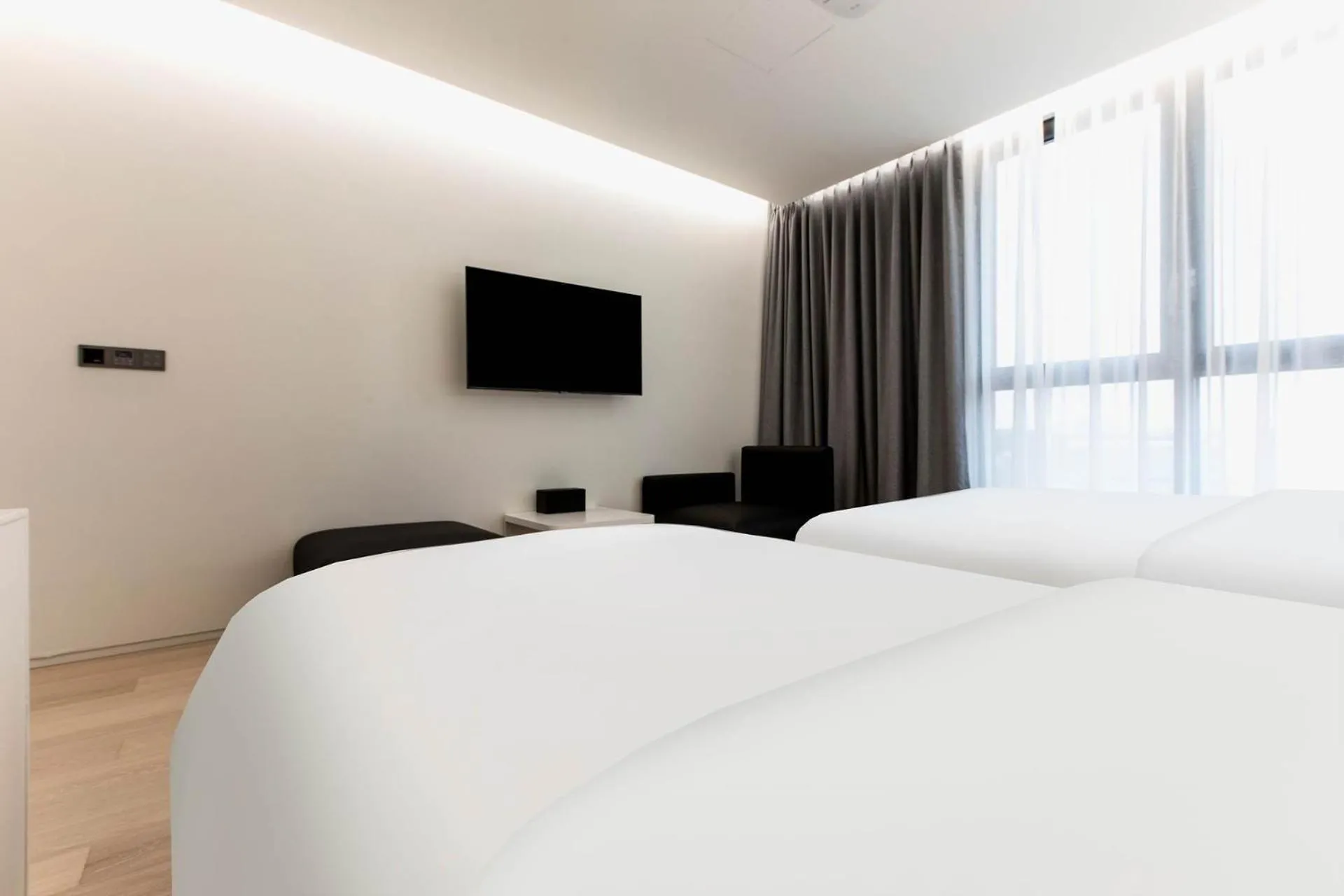 Bed in La Scene Hotel