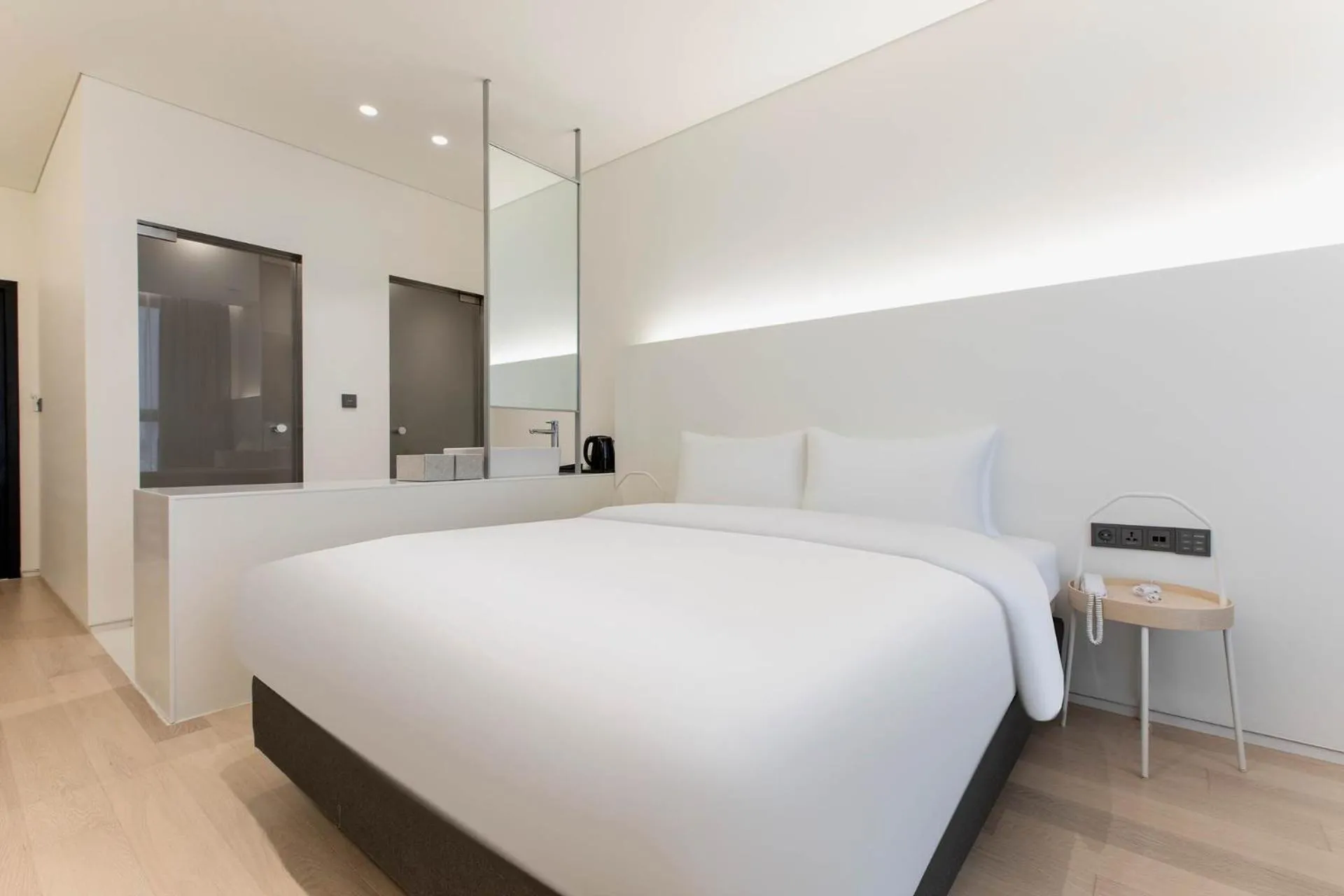 Bed in La Scene Hotel