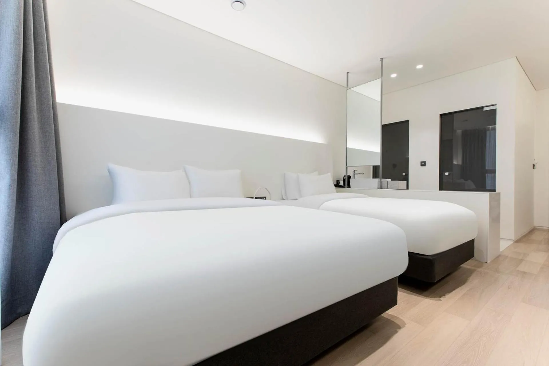 Bed in La Scene Hotel
