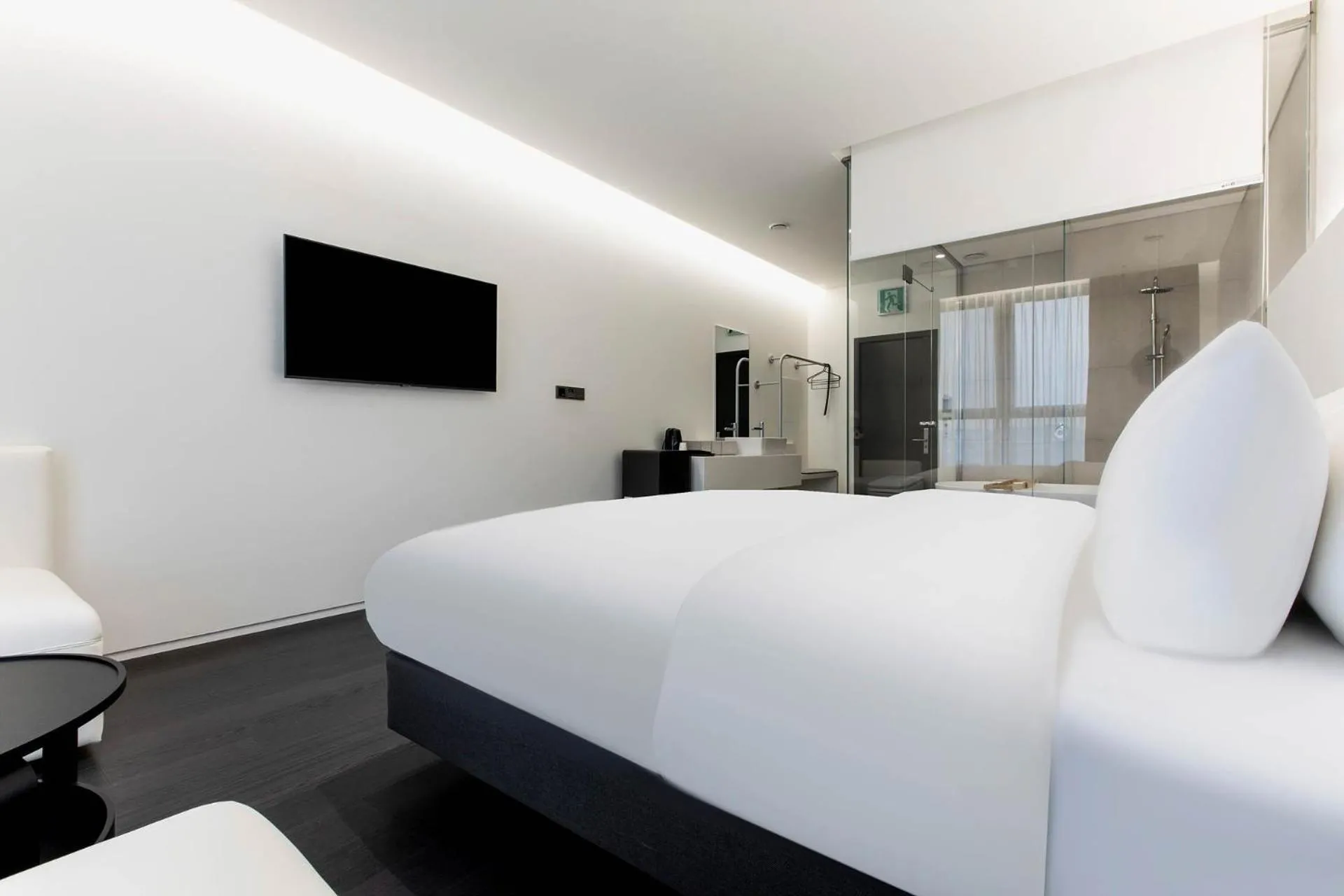 Bed in La Scene Hotel