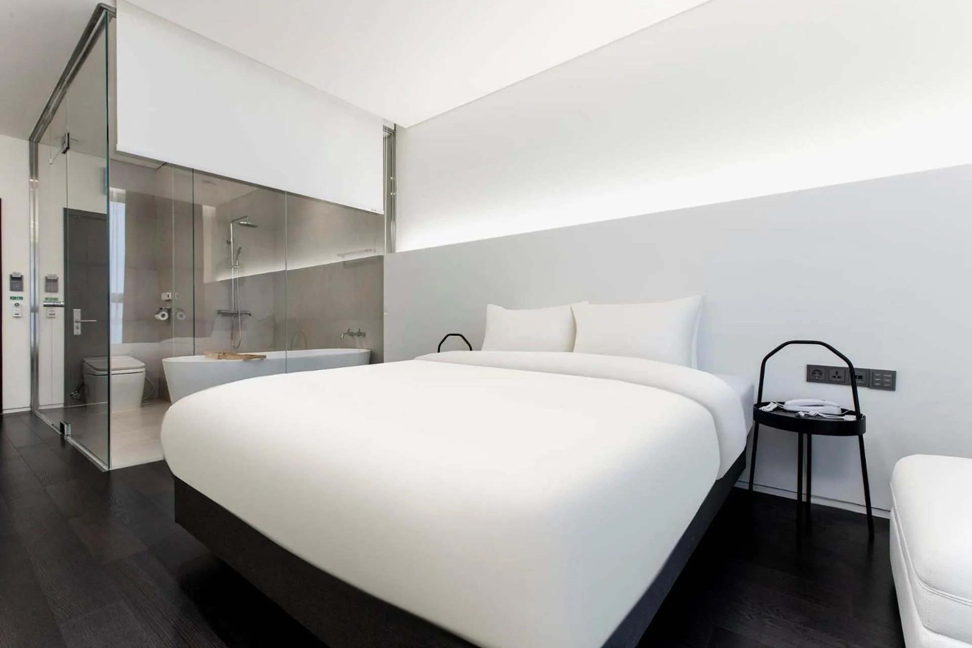 Bed in La Scene Hotel