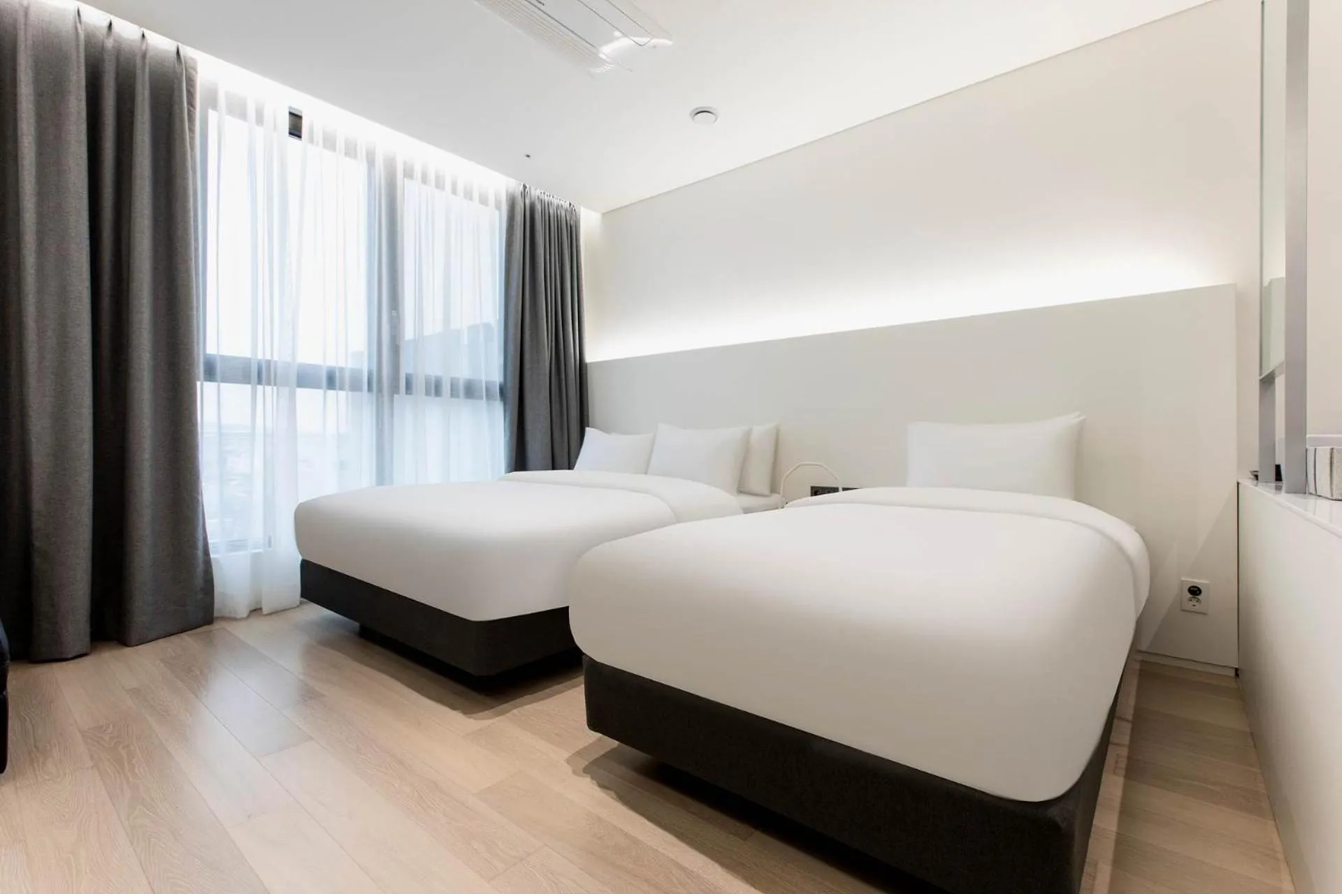 Bed in La Scene Hotel