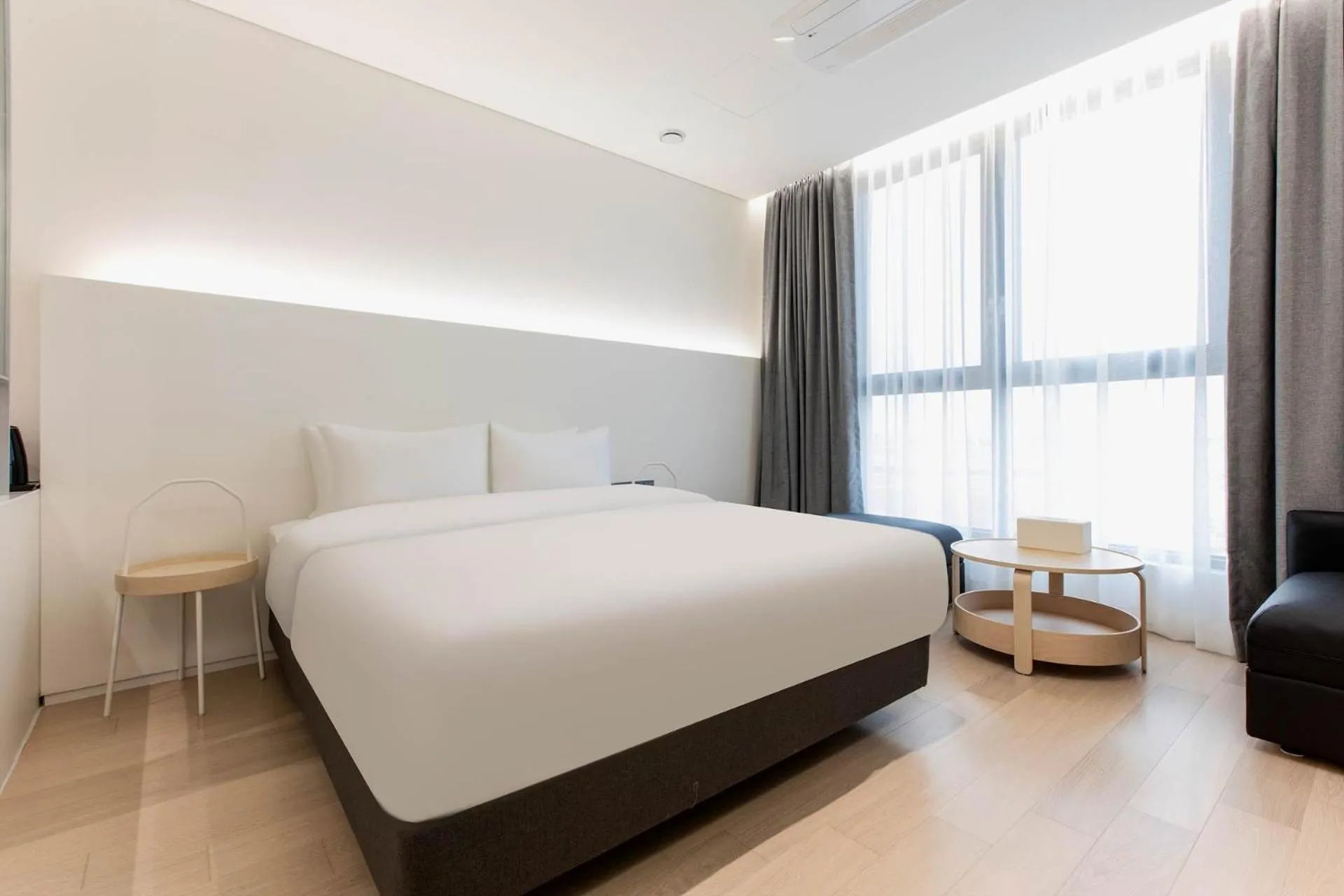 Bed in La Scene Hotel