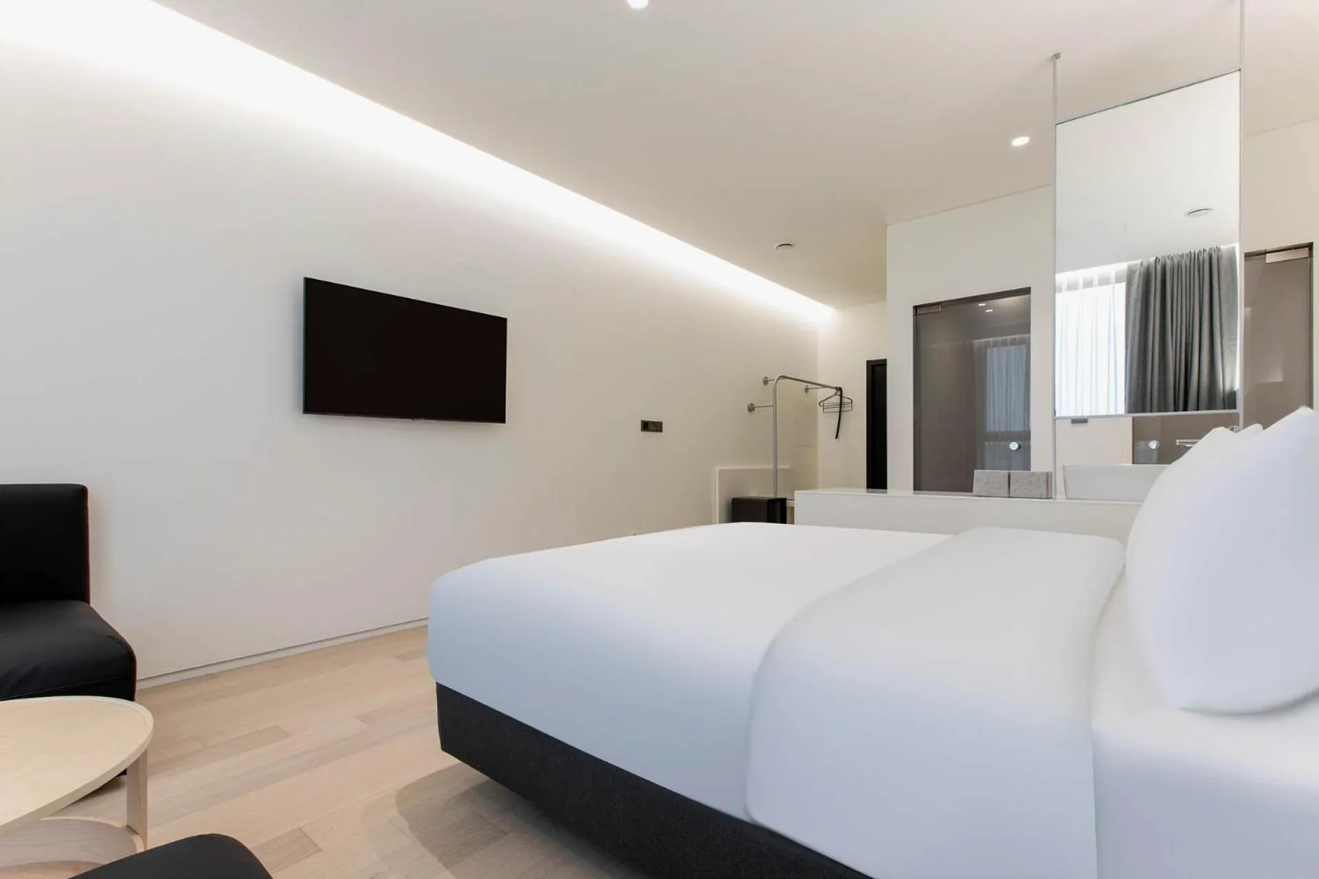 Bed in La Scene Hotel