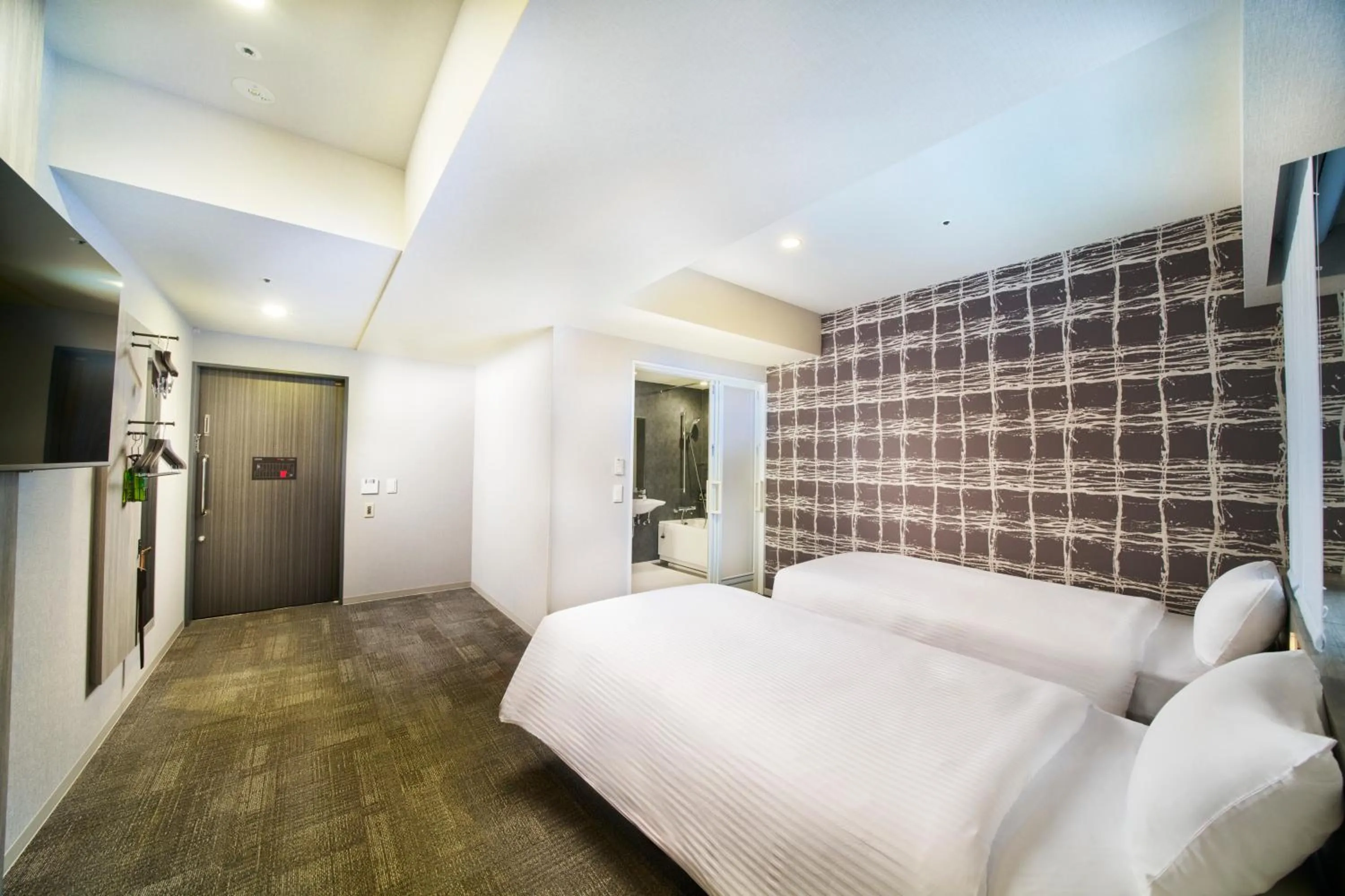 Photo of the whole room, Bed in KOKO HOTEL Osaka Namba Sennichimae