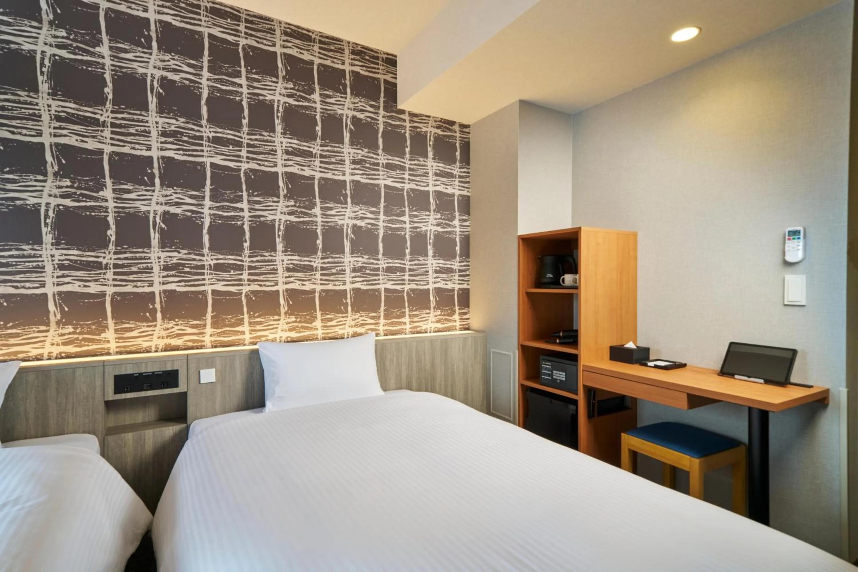 Photo of the whole room, Bed in KOKO HOTEL Osaka Namba Sennichimae