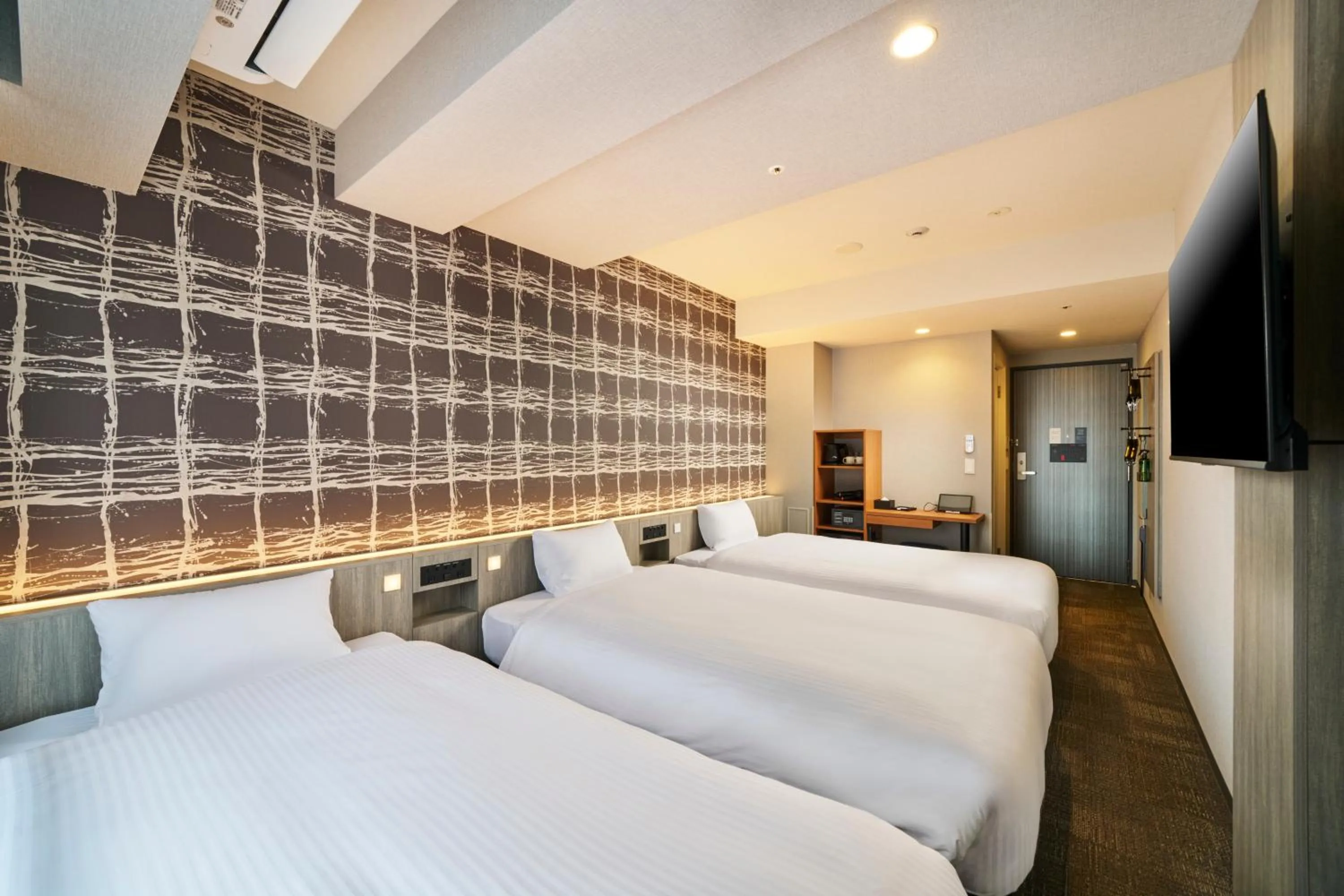 Photo of the whole room, Bed in KOKO HOTEL Osaka Namba Sennichimae
