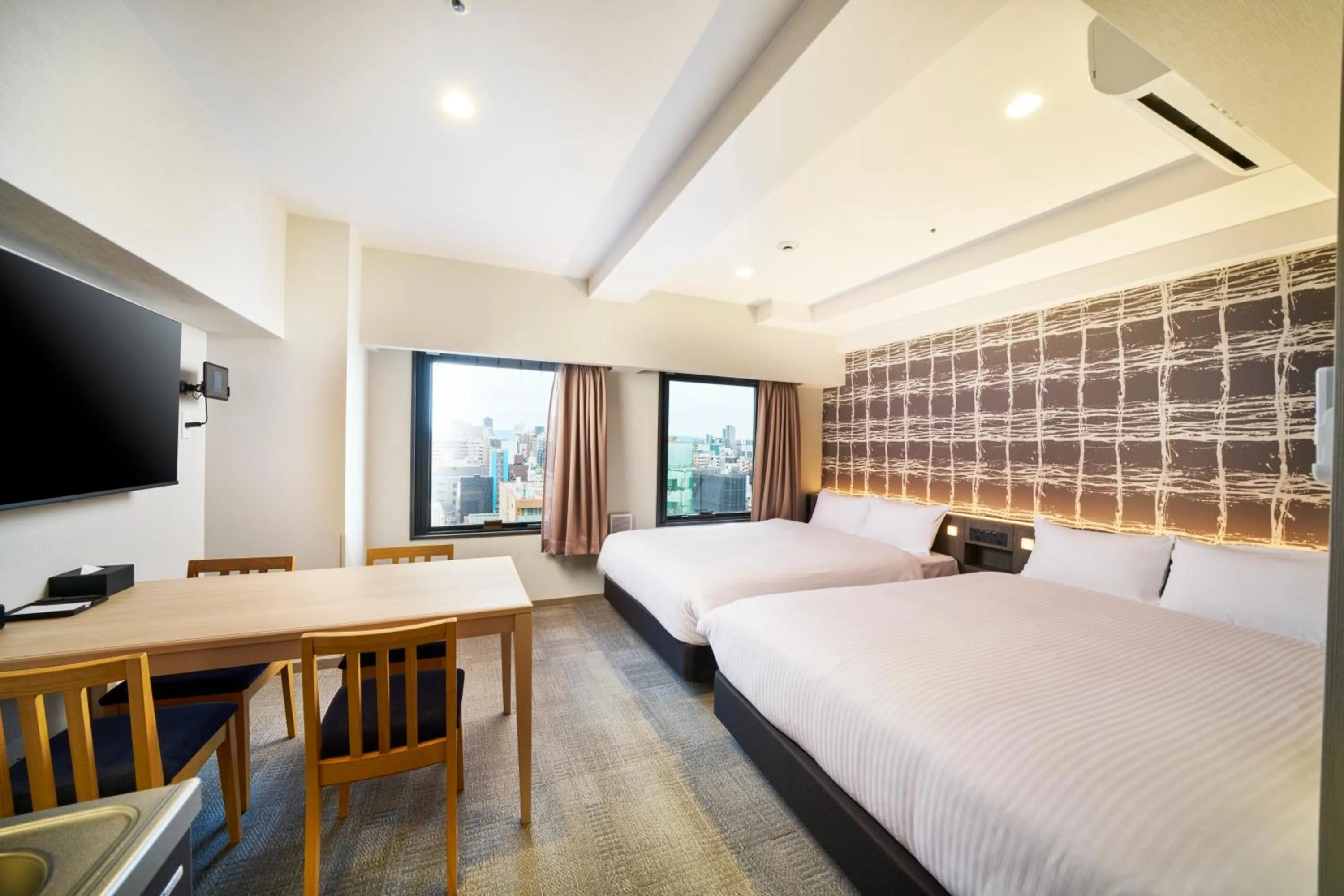 Photo of the whole room, Bed in KOKO HOTEL Osaka Namba Sennichimae