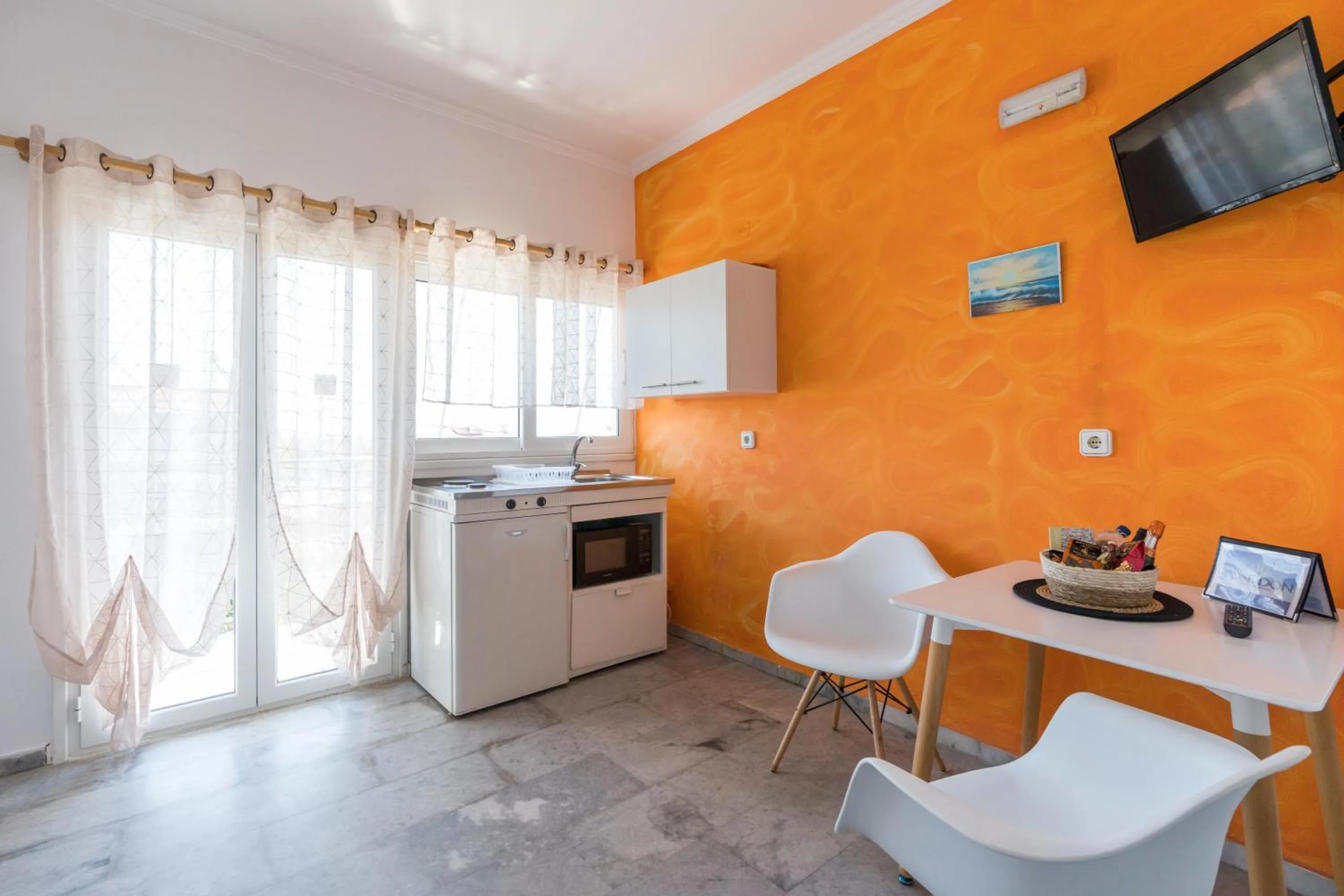 TV and multimedia in Poseidon Apartments