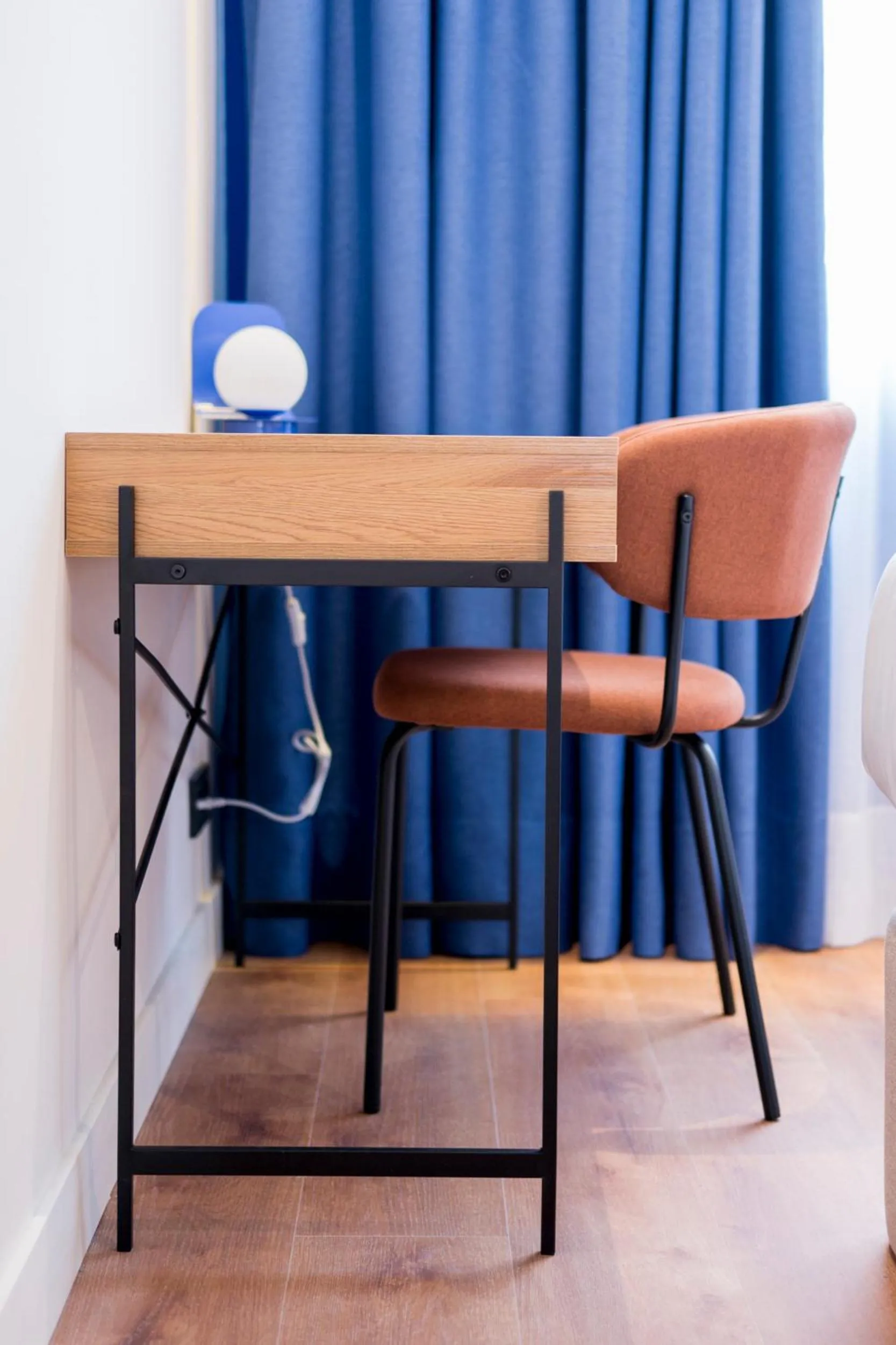 Seating area in Iconic Suites