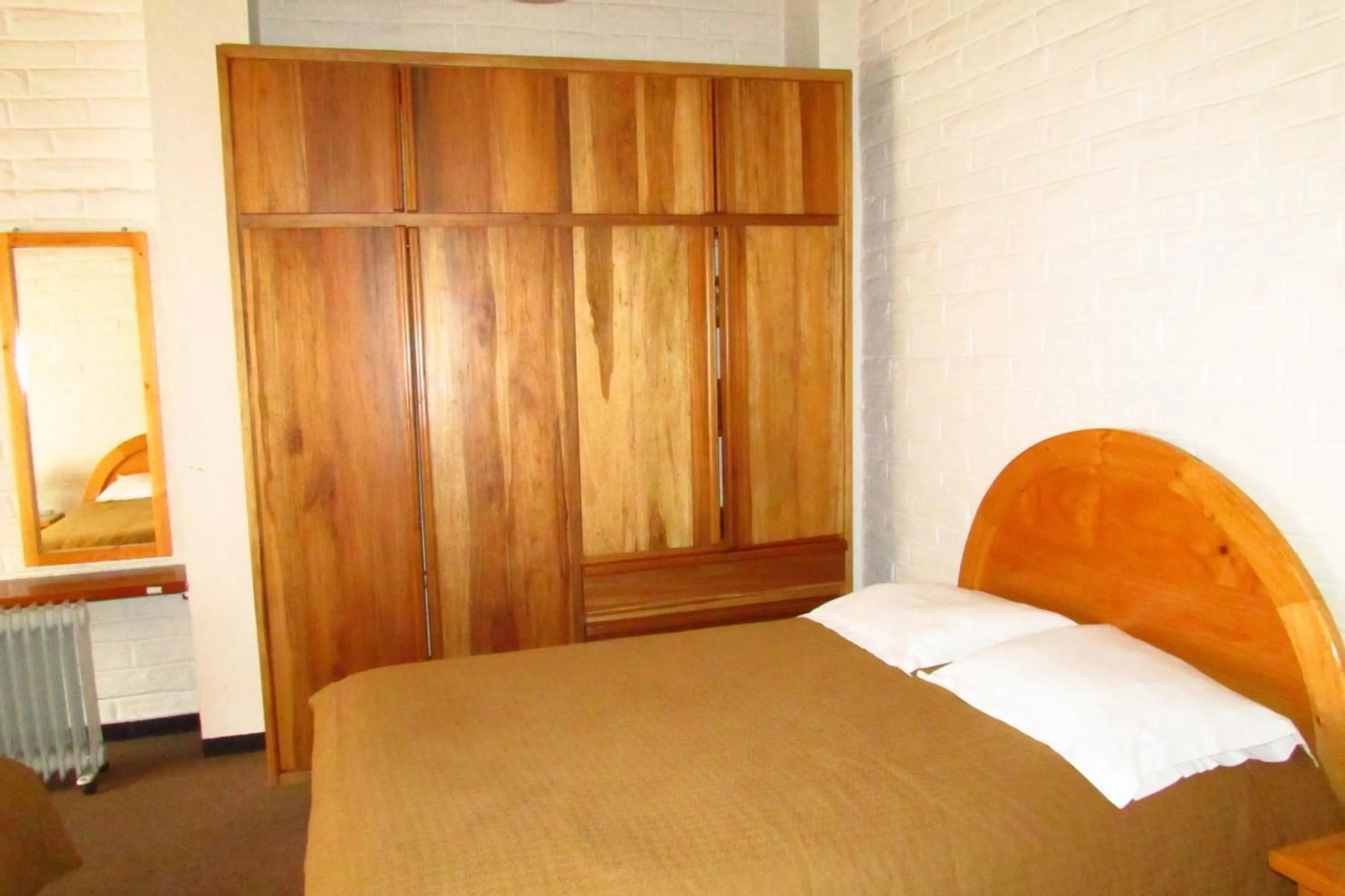 Bed in Apartamentos Los Quipus