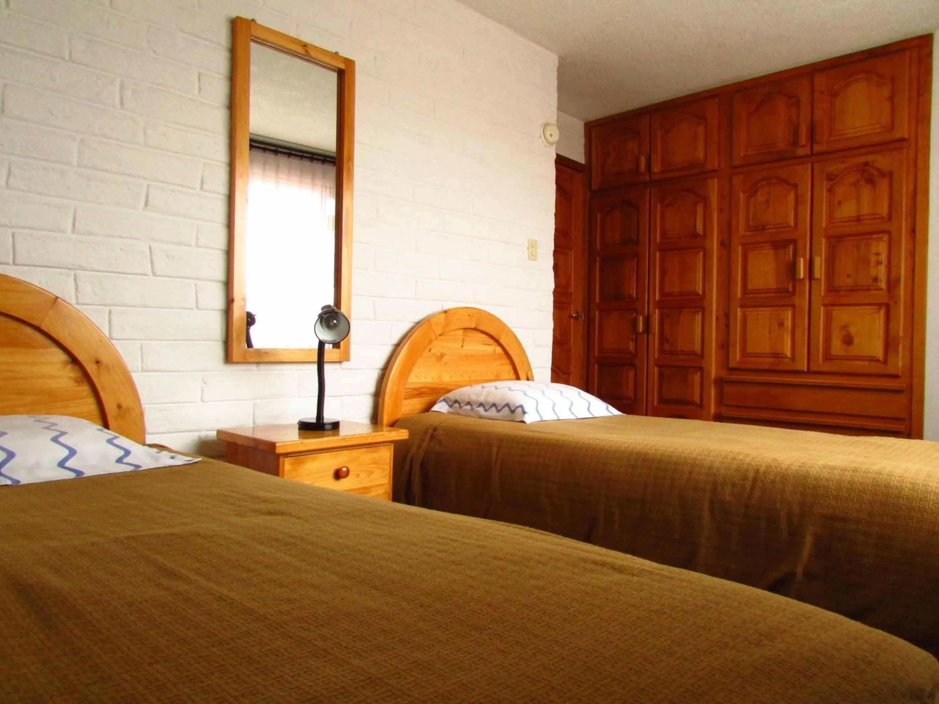 Bed in Apartamentos Los Quipus