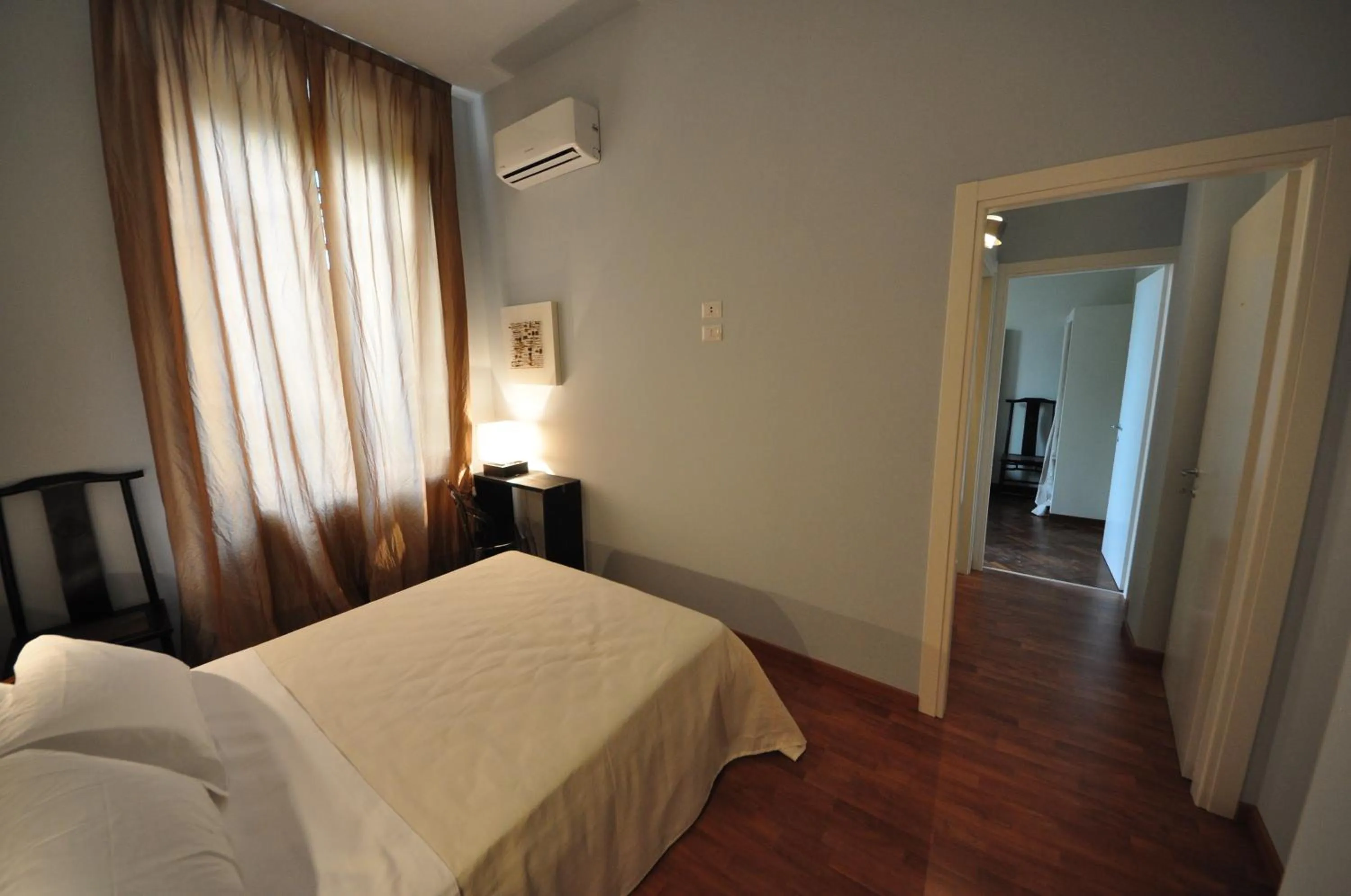 Photo of the whole room, Bed in Lucca in Villa Lucrezia