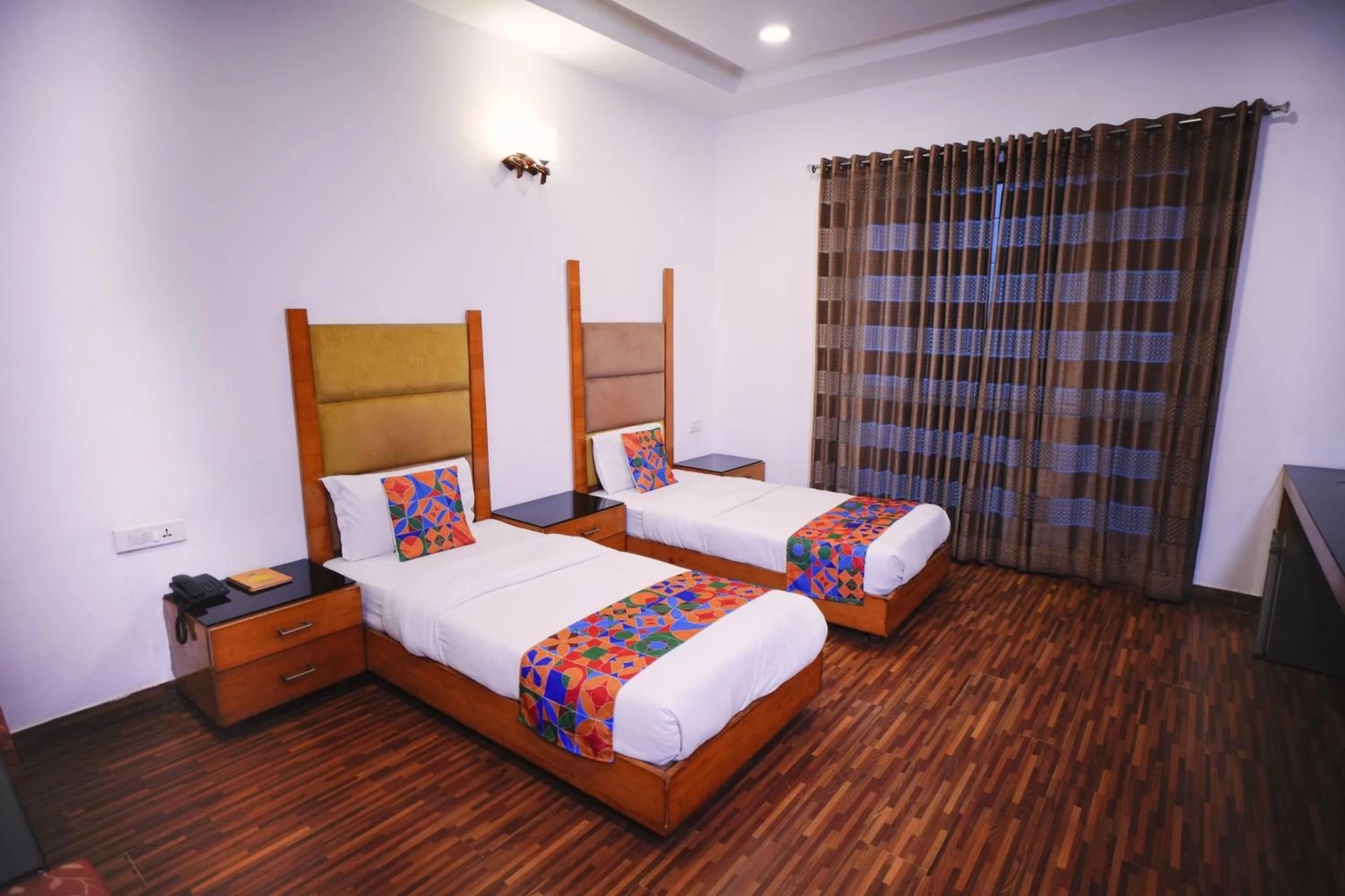 Bed in Hari's Court Inns & Hotels