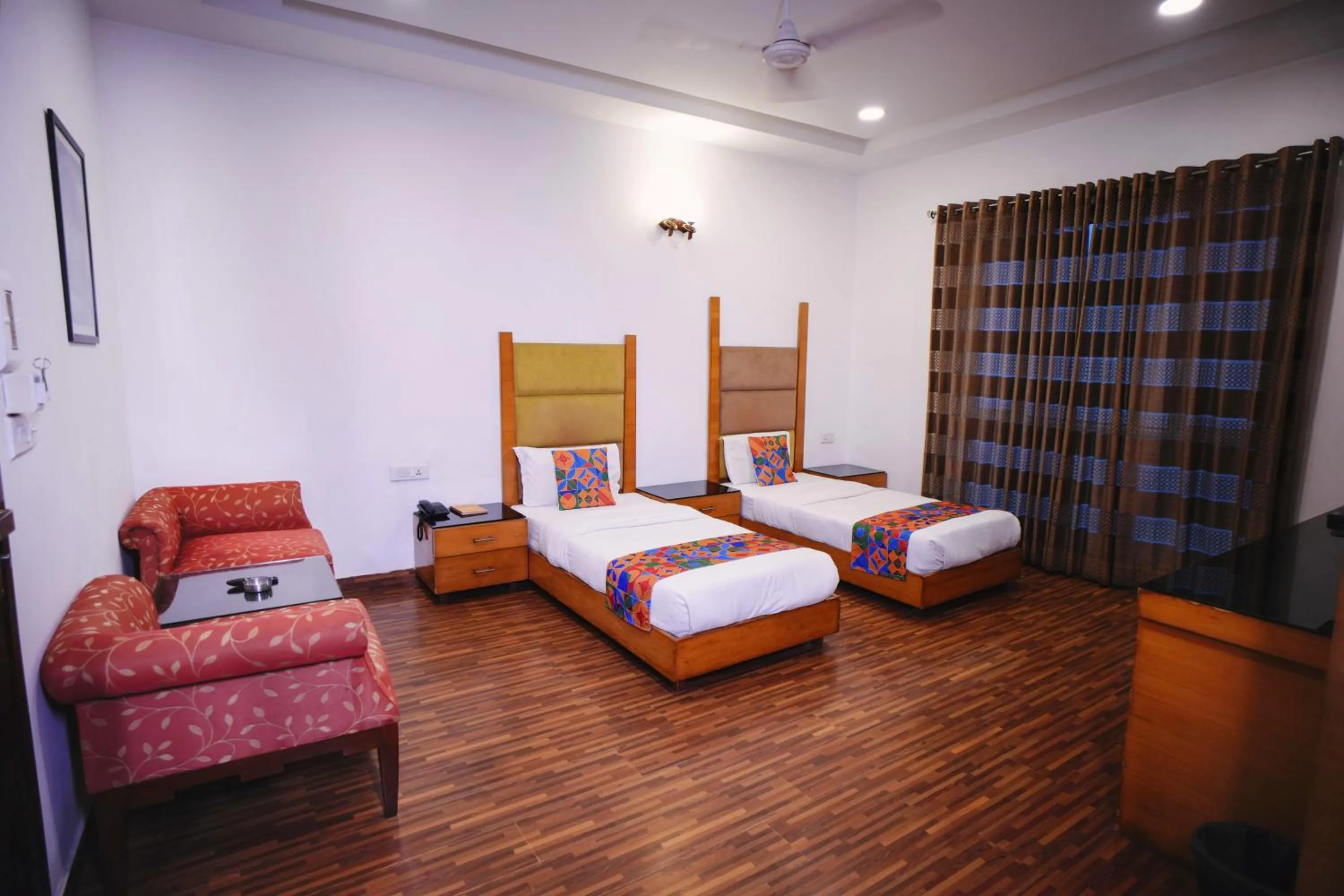 Bed in Hari's Court Inns & Hotels