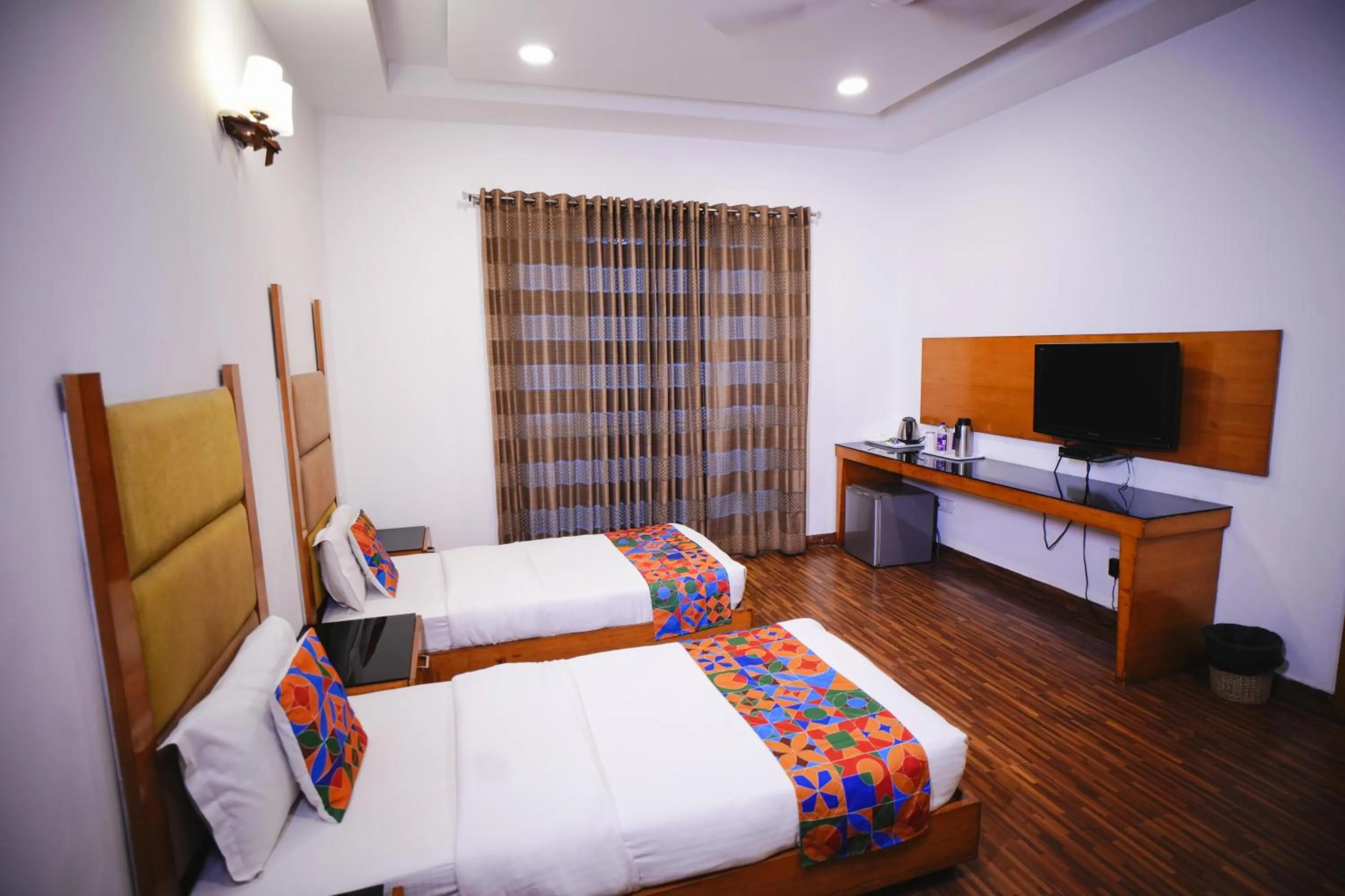 Bed in Hari's Court Inns & Hotels