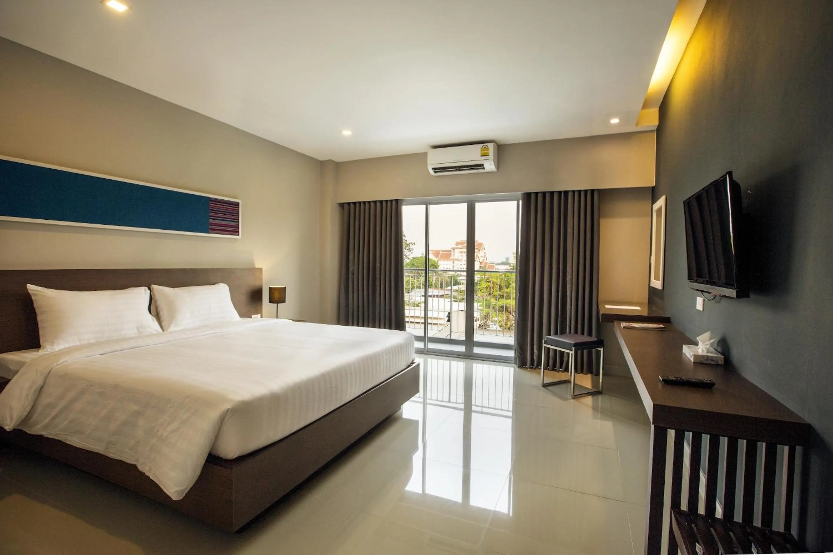 Photo of the whole room, Bed in V Hotel Ubon Ratchathani