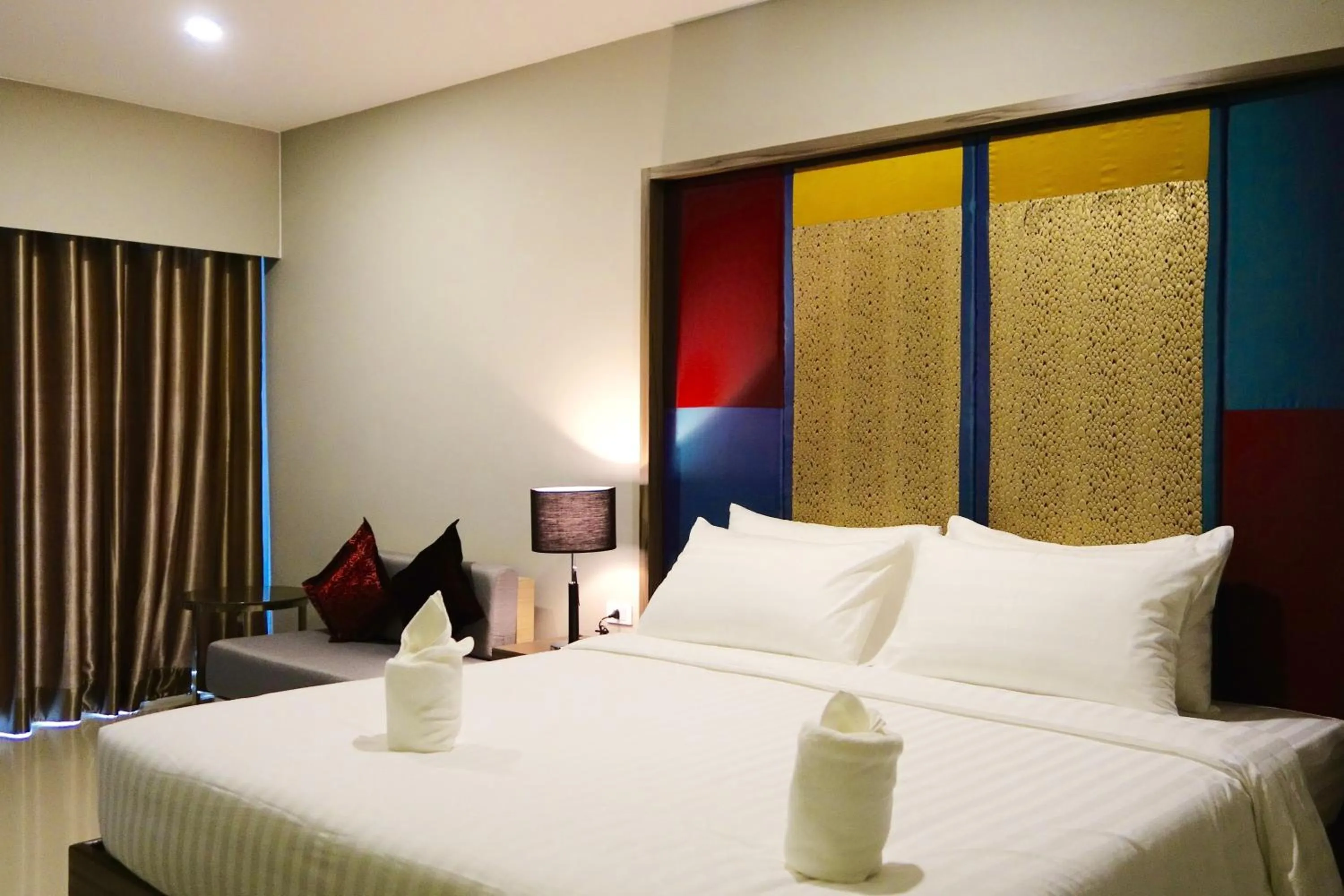 Photo of the whole room, Bed in V Hotel Ubon Ratchathani