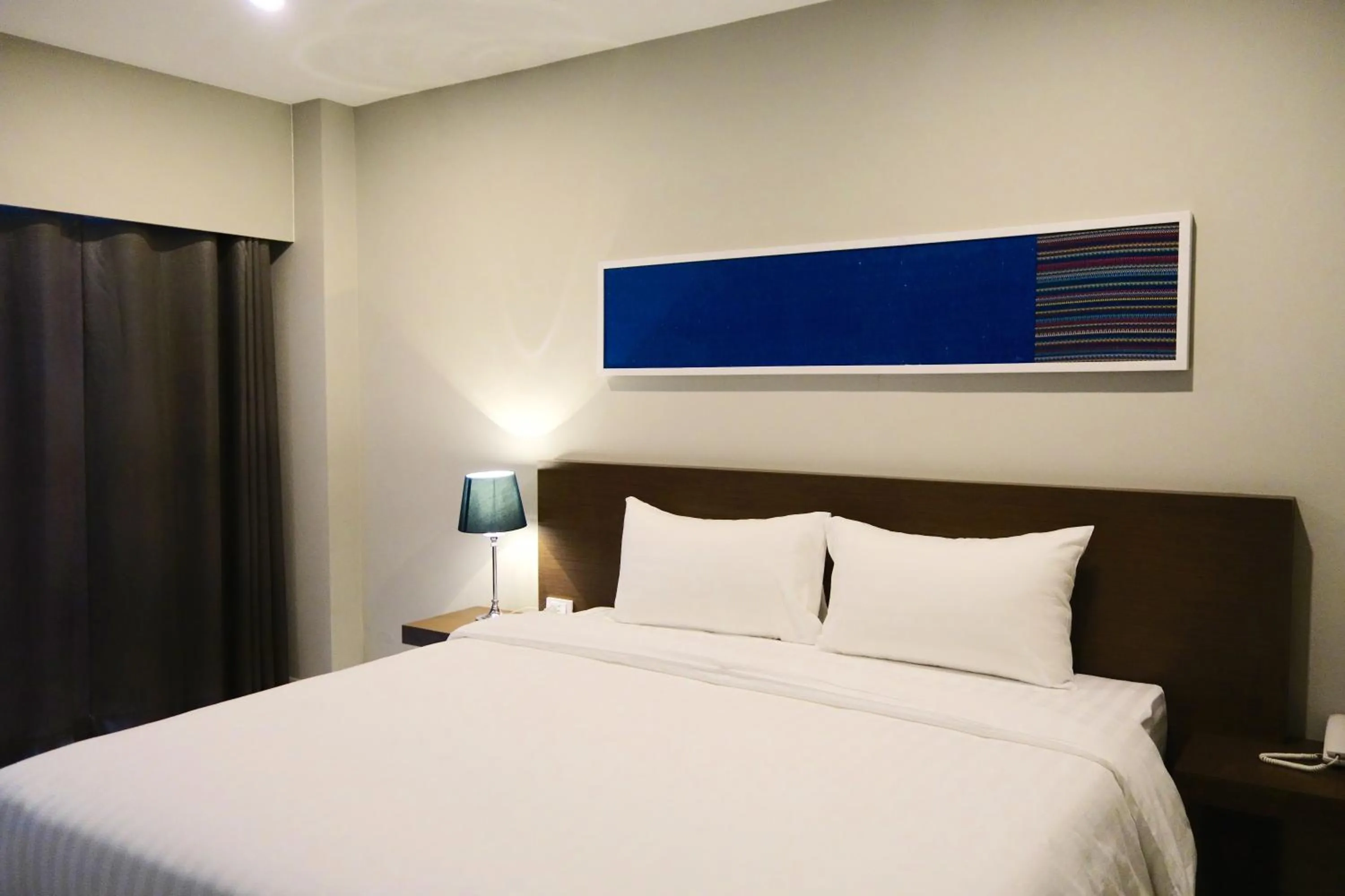 Photo of the whole room, Bed in V Hotel Ubon Ratchathani