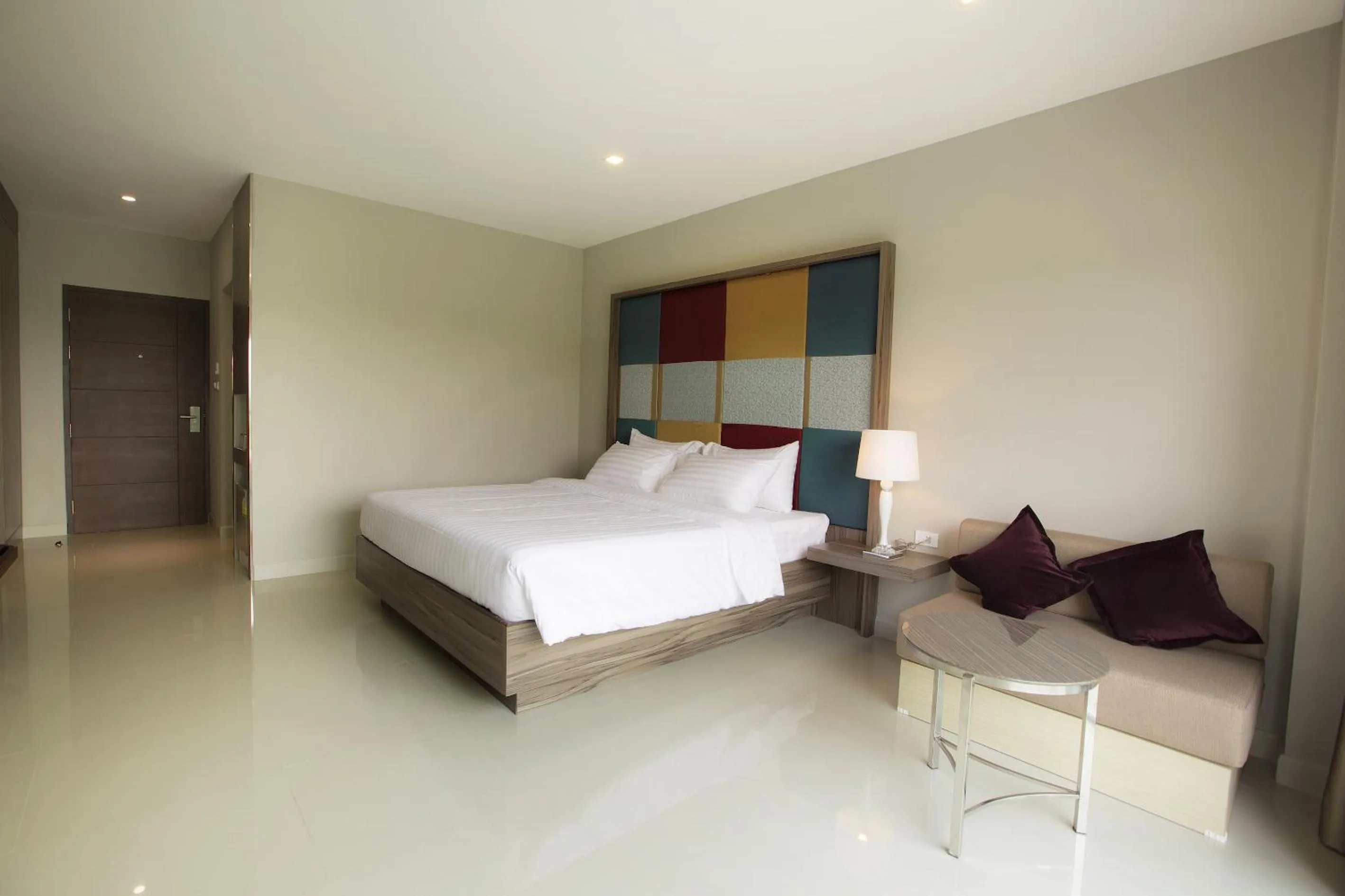 Photo of the whole room, Bed in V Hotel Ubon Ratchathani