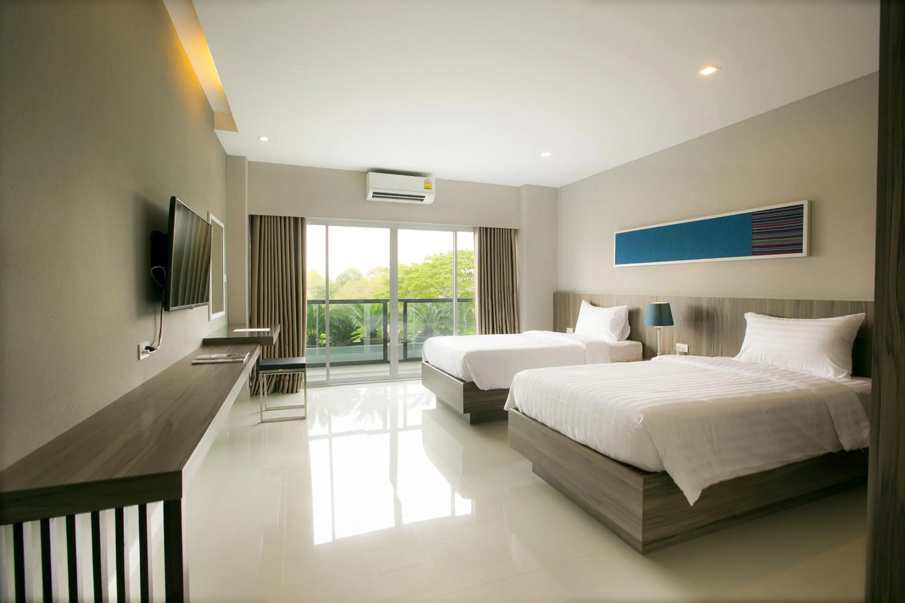 Photo of the whole room, Bed in V Hotel Ubon Ratchathani