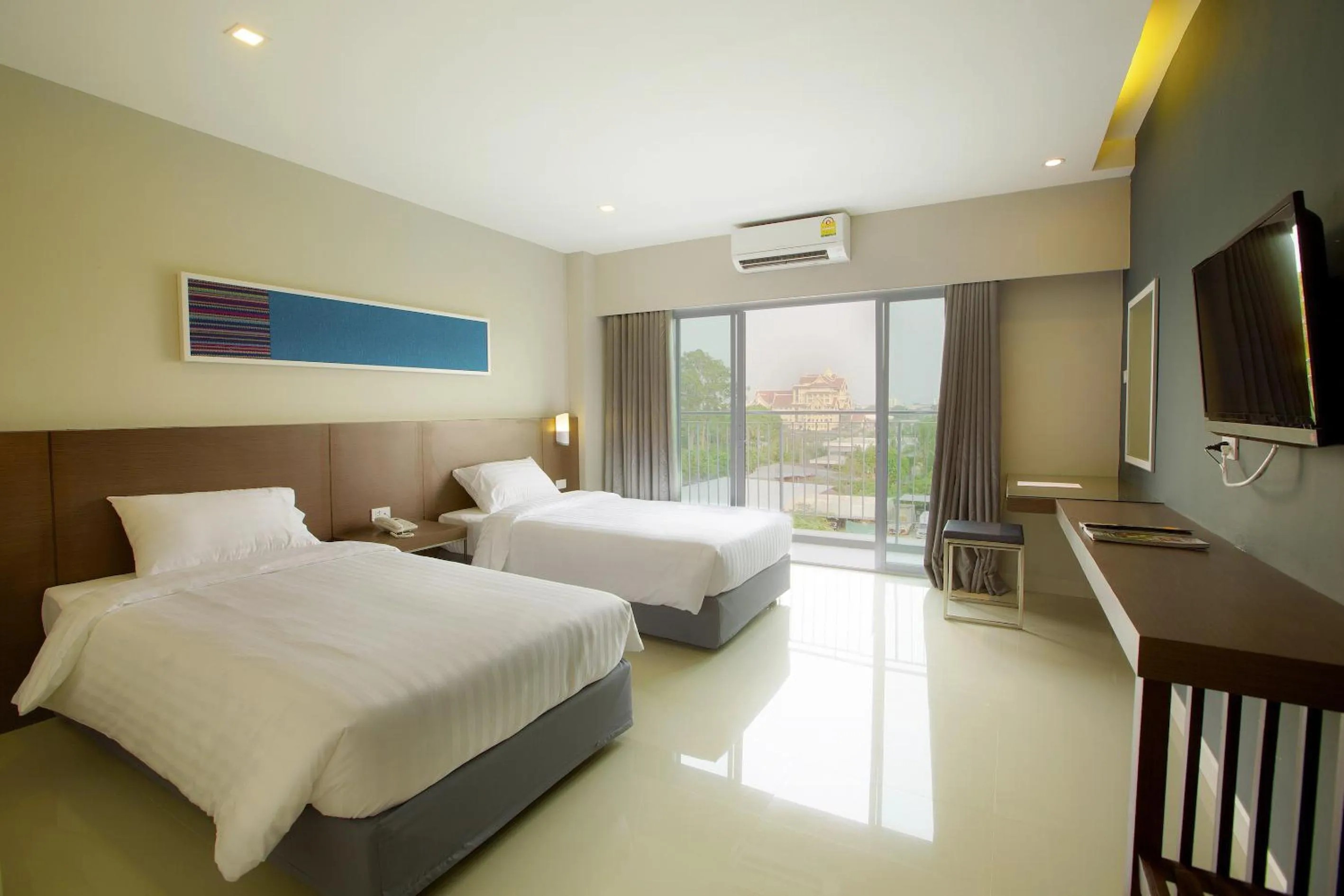 Photo of the whole room, Bed in V Hotel Ubon Ratchathani