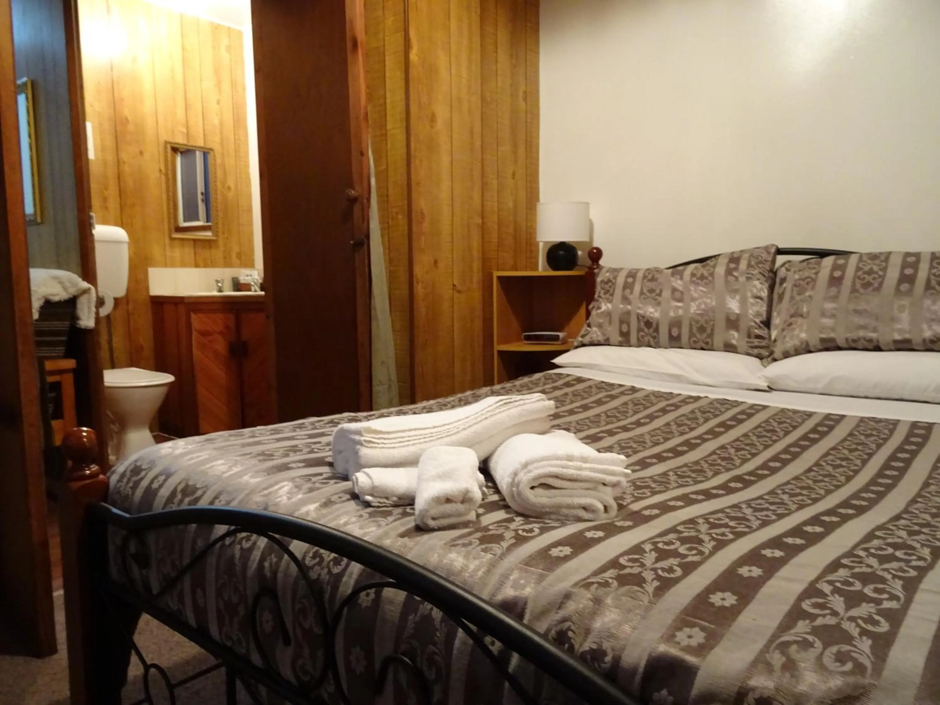 Bed in Crayfish Creek Van & Cabin Park