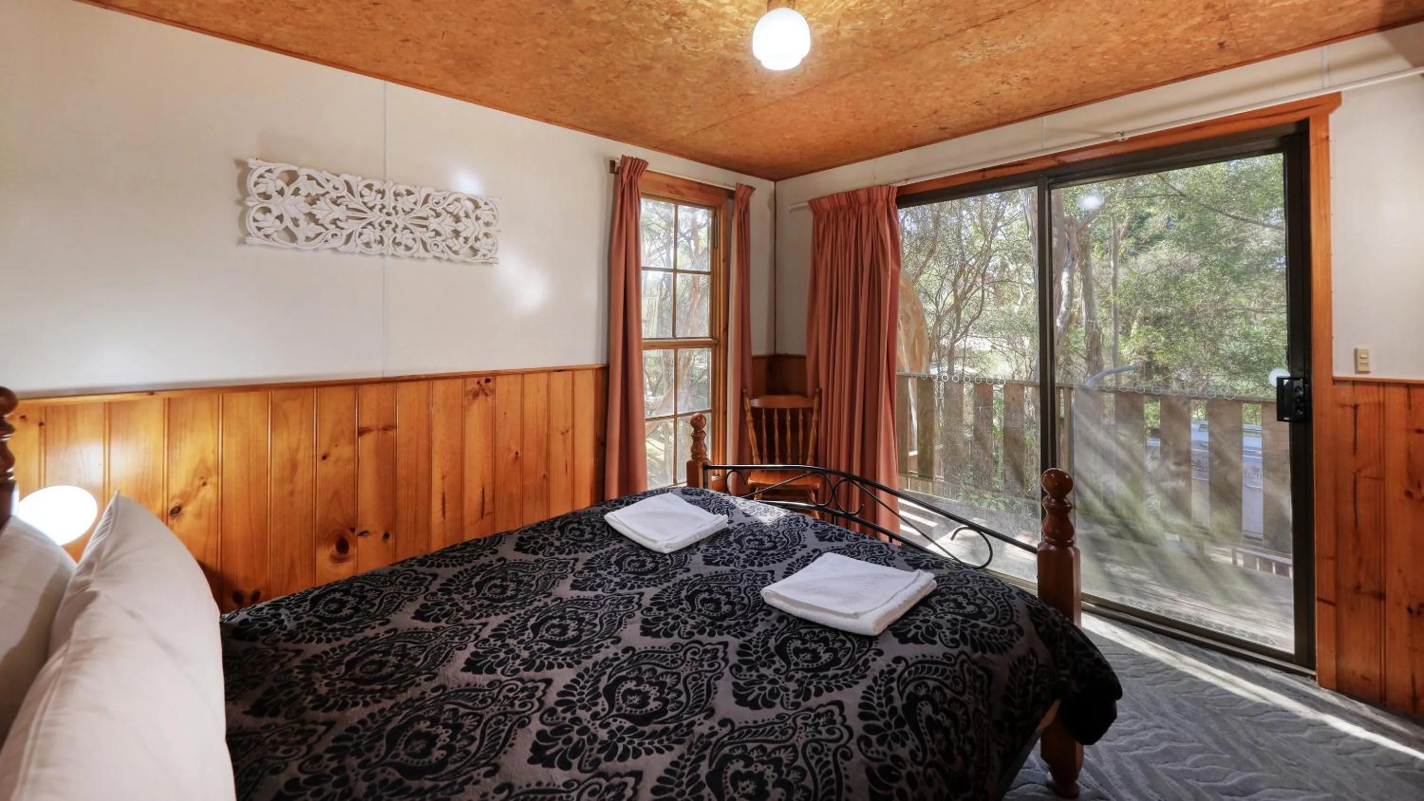 Bed in Crayfish Creek Van & Cabin Park