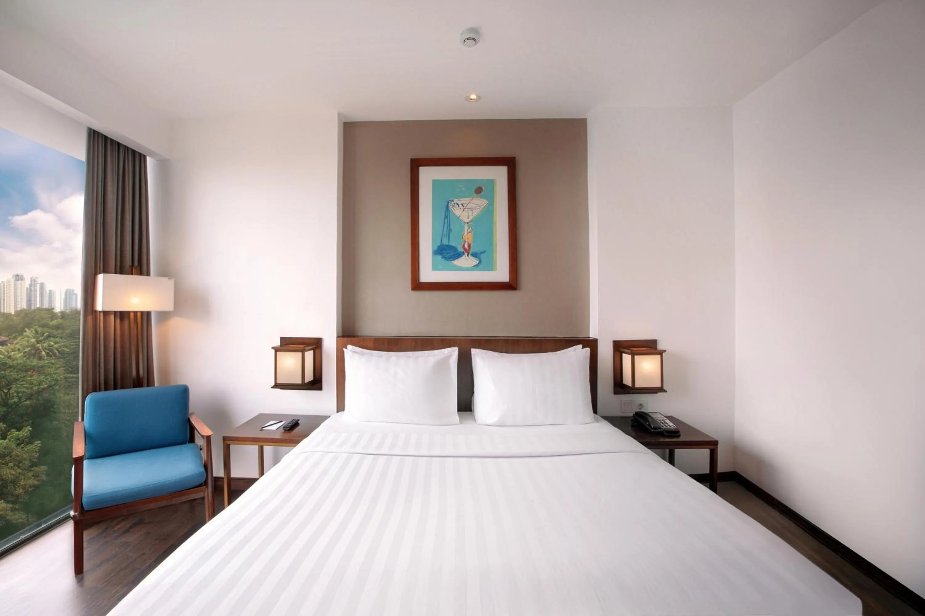 Bed in Veranda Hotel Pakubuwono