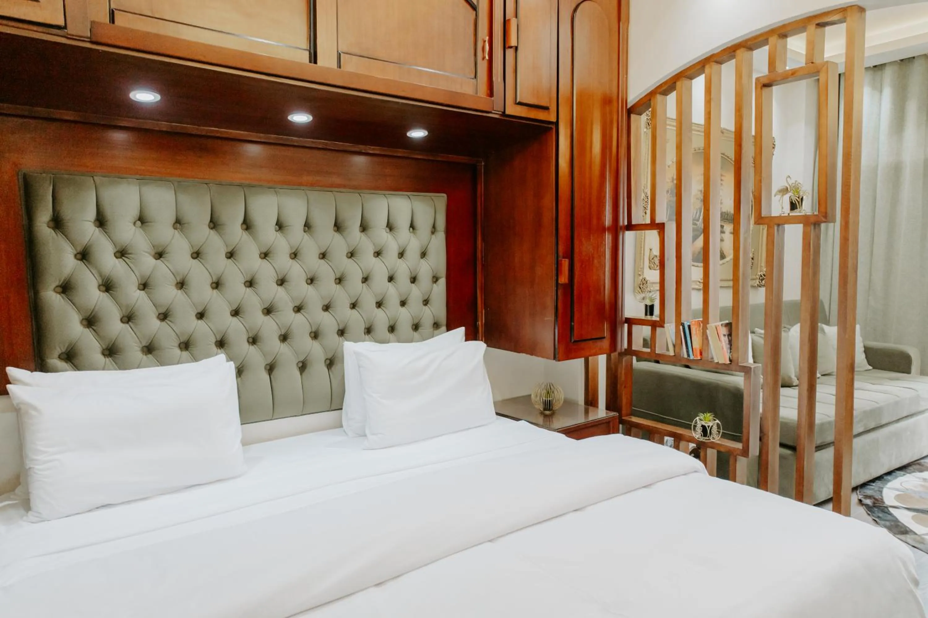 Bed in Aton Suites Luxor Resort East Bank Nile View