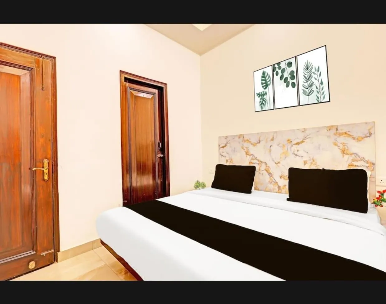 Bed in THE KRISHNA's BLISS HOTEL