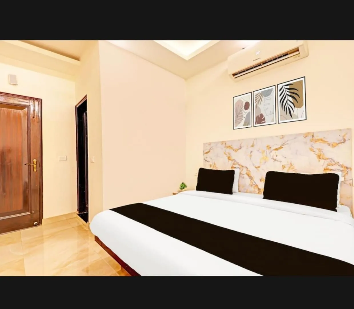 Bed in THE KRISHNA's BLISS HOTEL