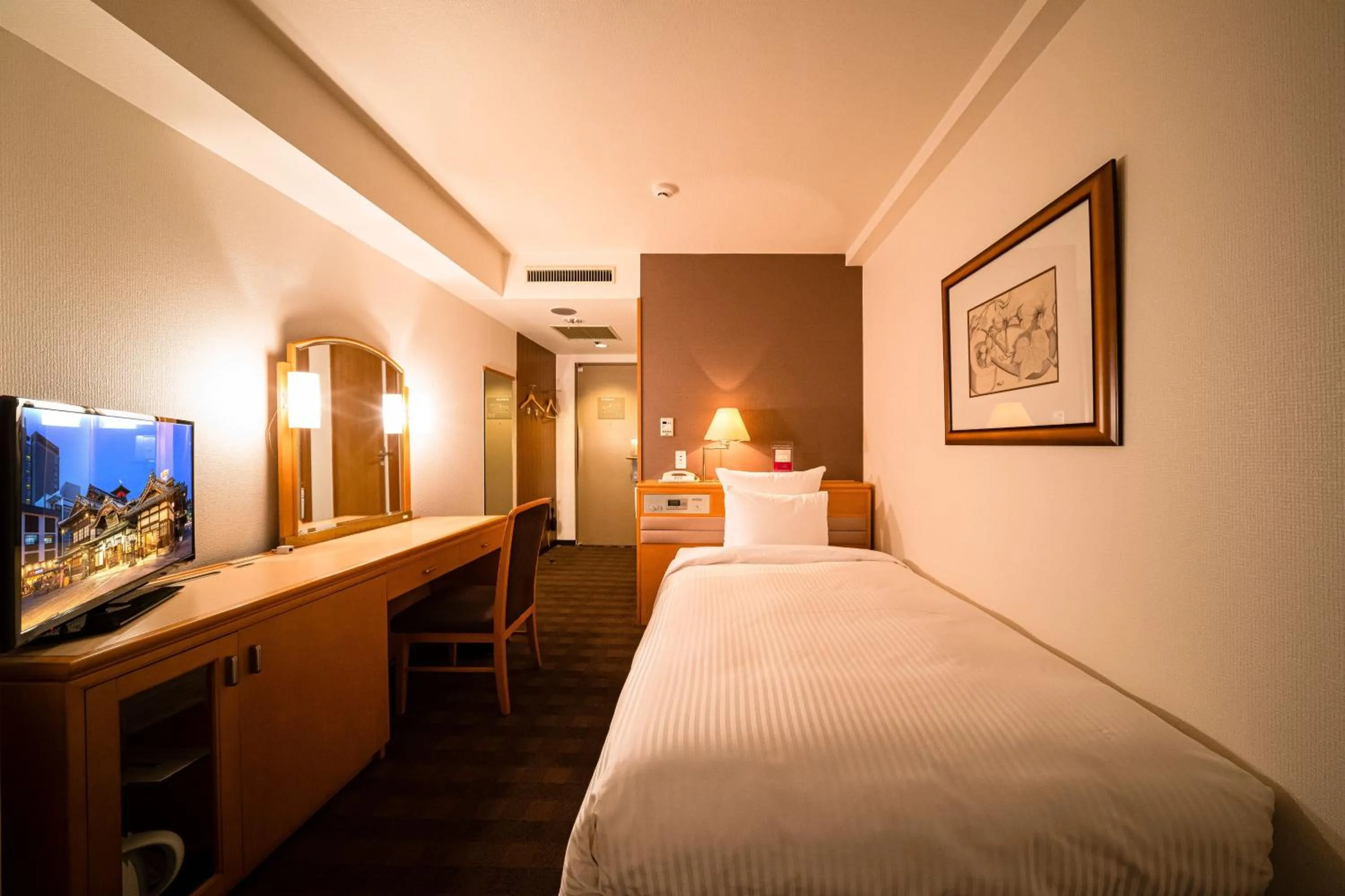 Photo of the whole room, Bed in ANA Crowne Plaza Matsuyama by IHG