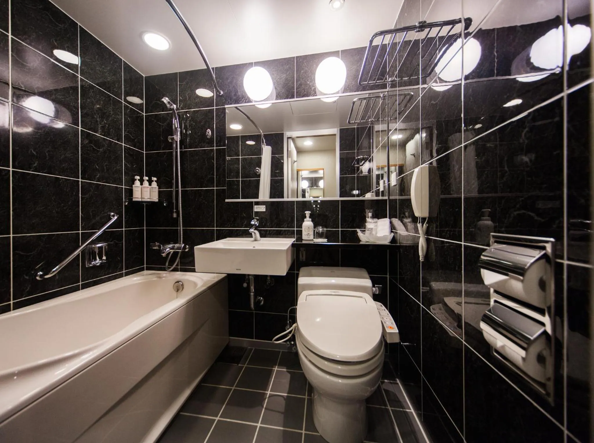 Bathroom in ANA Crowne Plaza Matsuyama by IHG