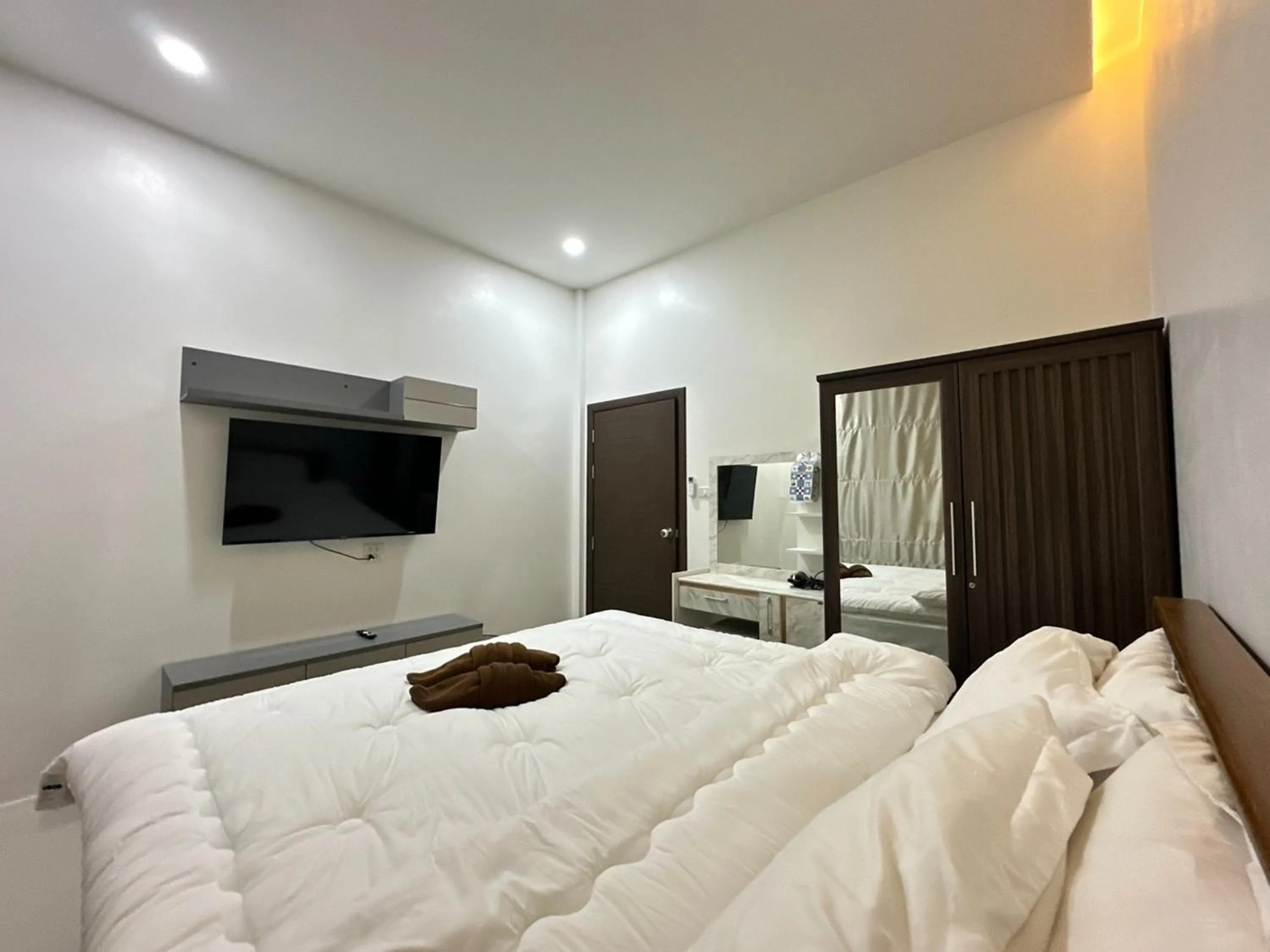 Bed in Golden Palm Resort