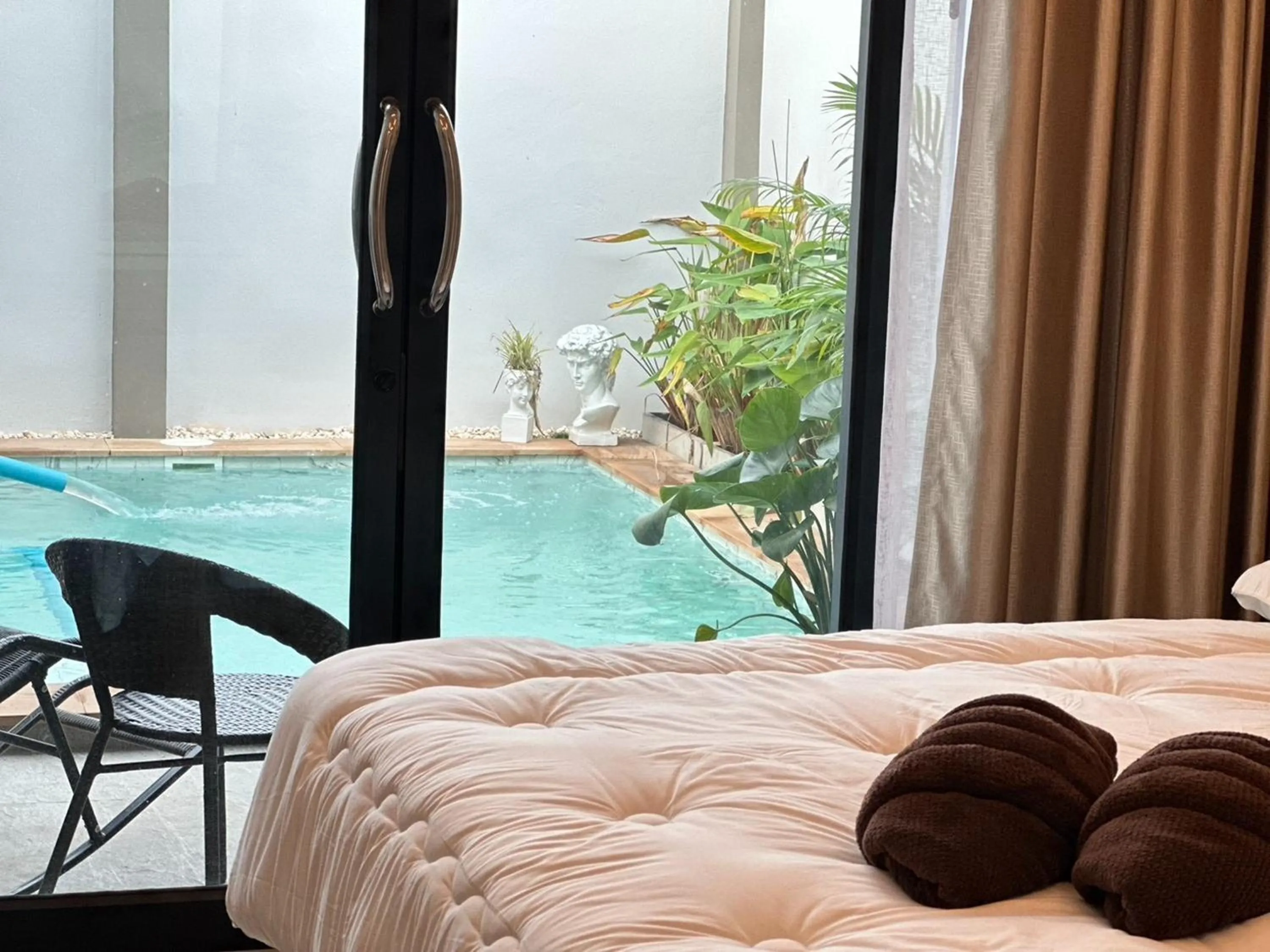 Bed in Golden Palm Resort