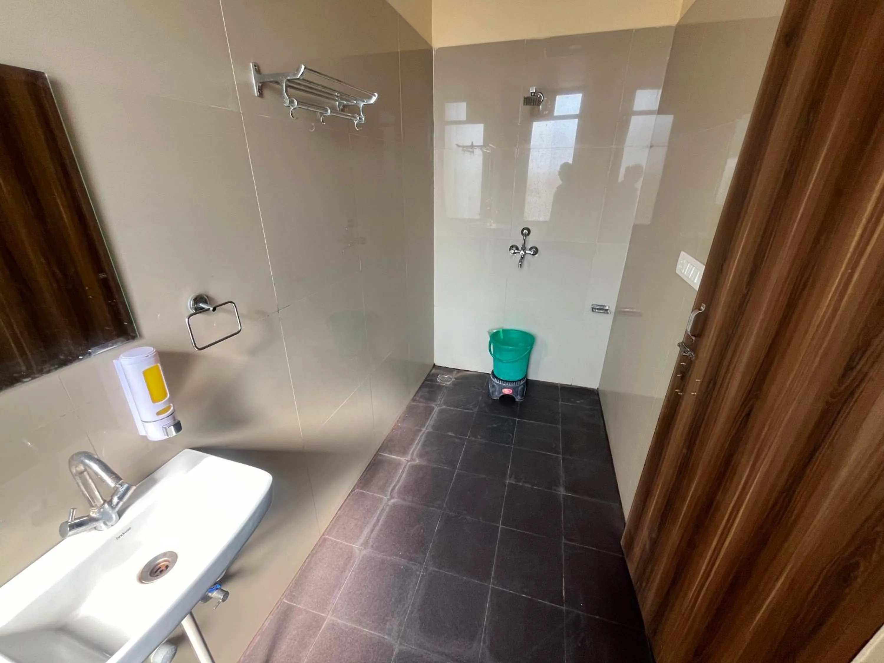 Bathroom in Hotel O Golden Manor Inn