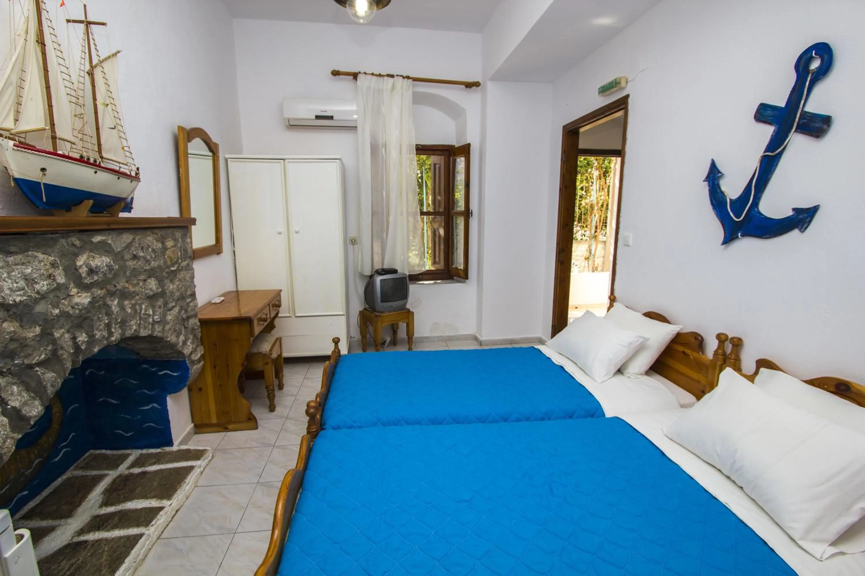 Bedroom in Symi Center Hotel