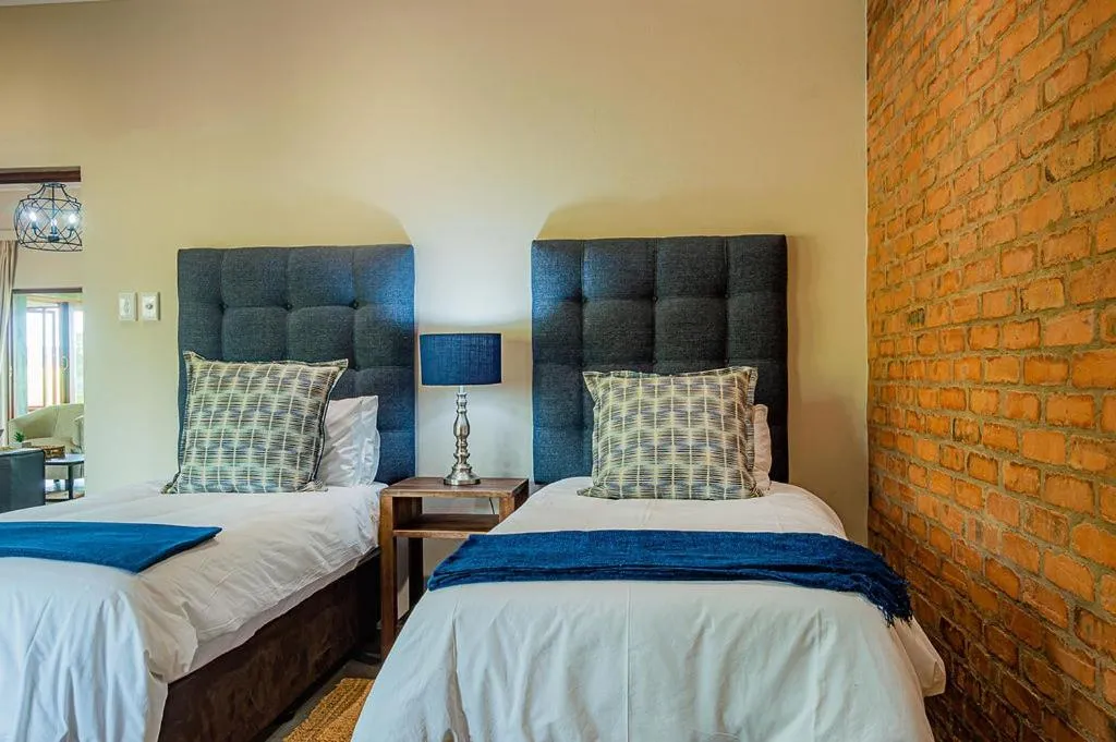 Bed in Hilton Bush Lodge & Function Venue