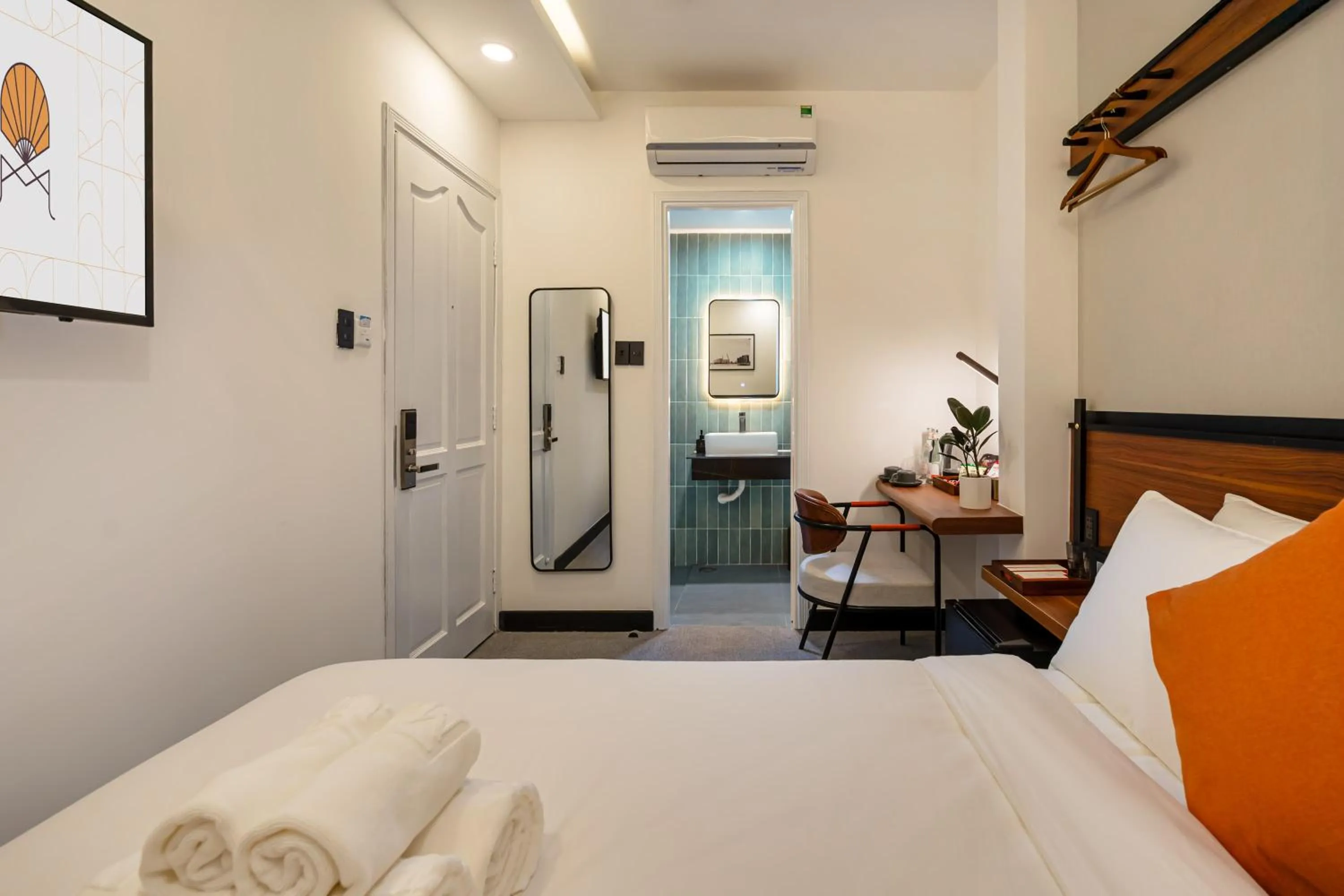 TV and multimedia, Bed in Metrolux City Contemporary Hotel