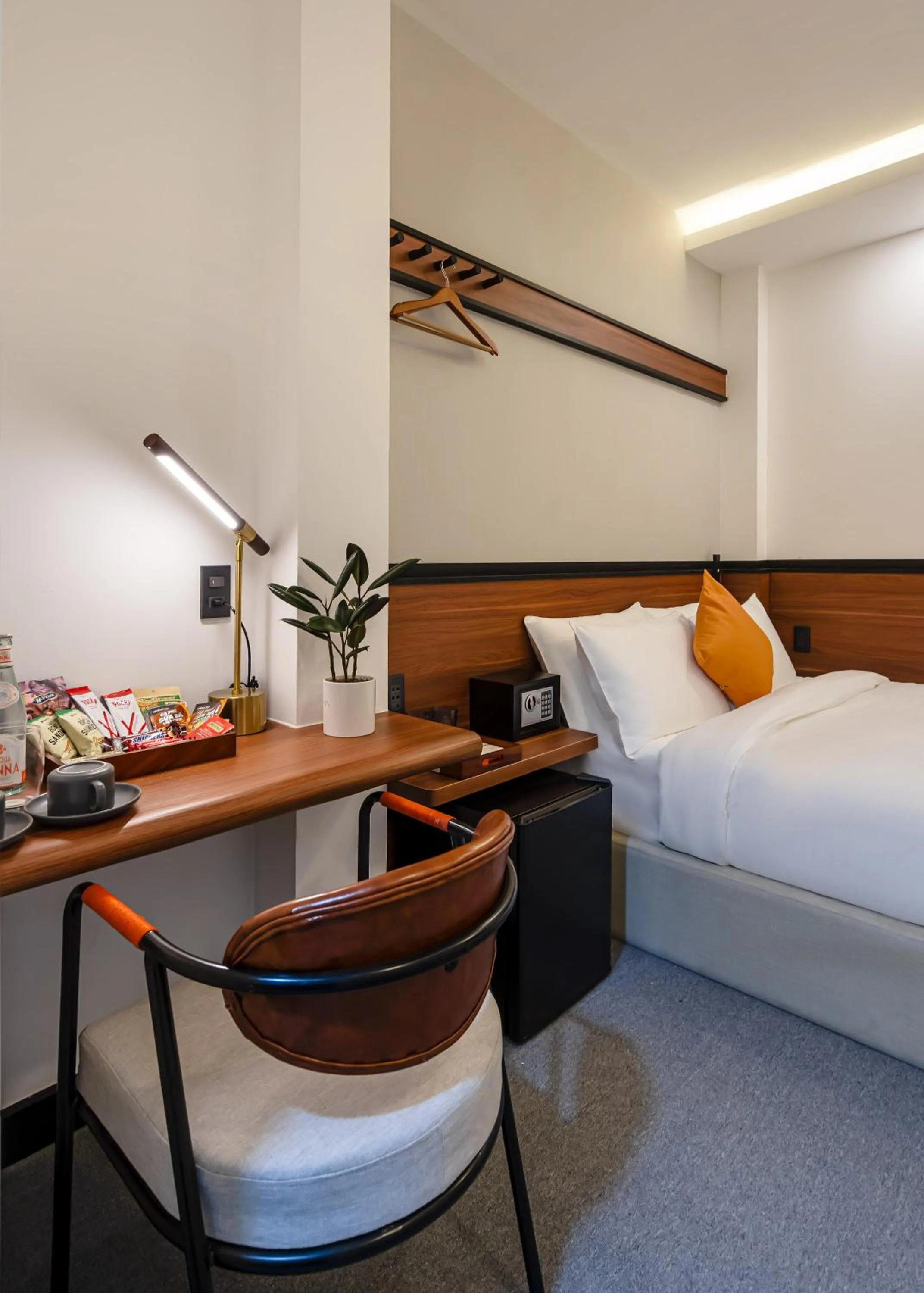 Bed in Metrolux City Contemporary Hotel