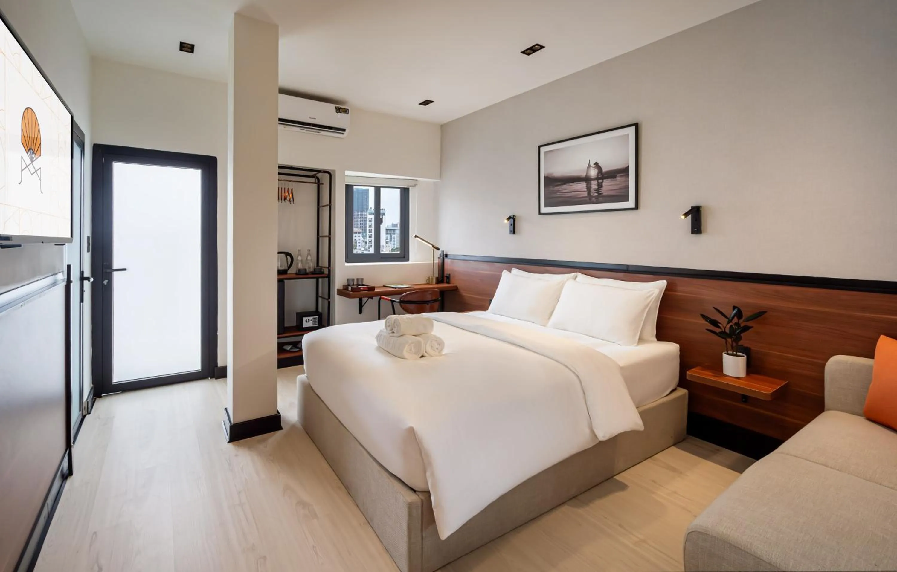 Bed in Metrolux City Contemporary Hotel