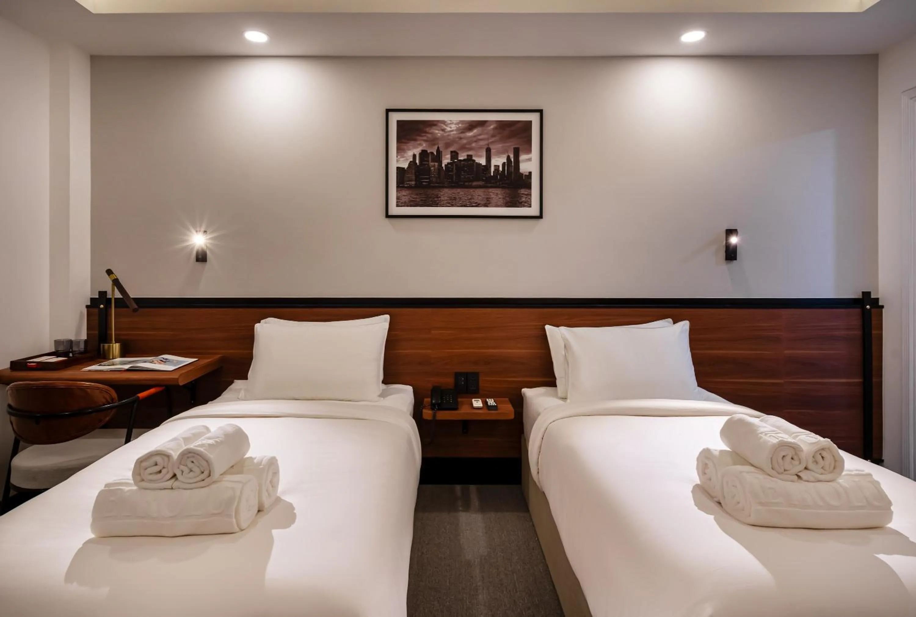 Bed in Metrolux City Contemporary Hotel