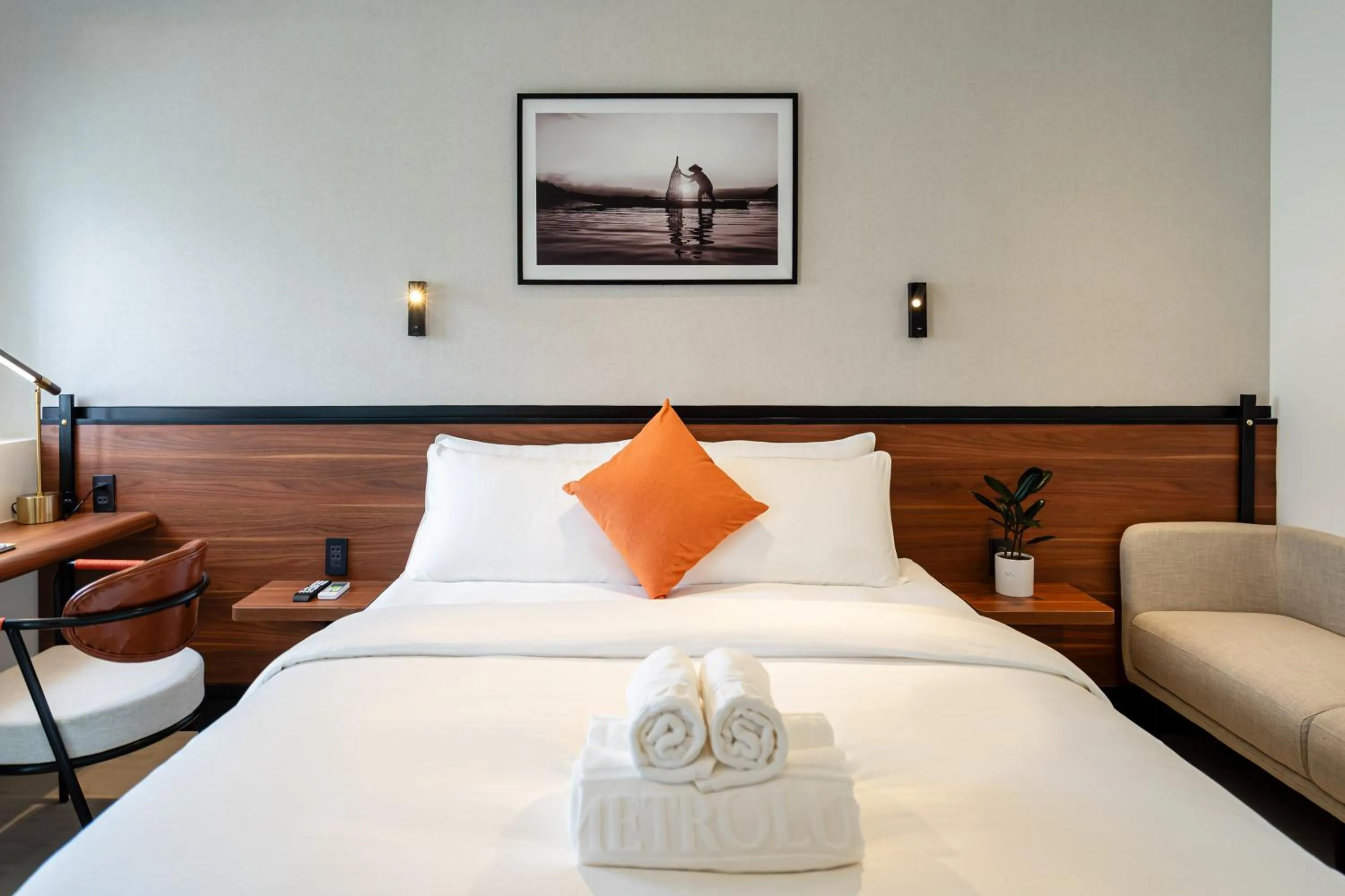 Bed in Metrolux City Contemporary Hotel