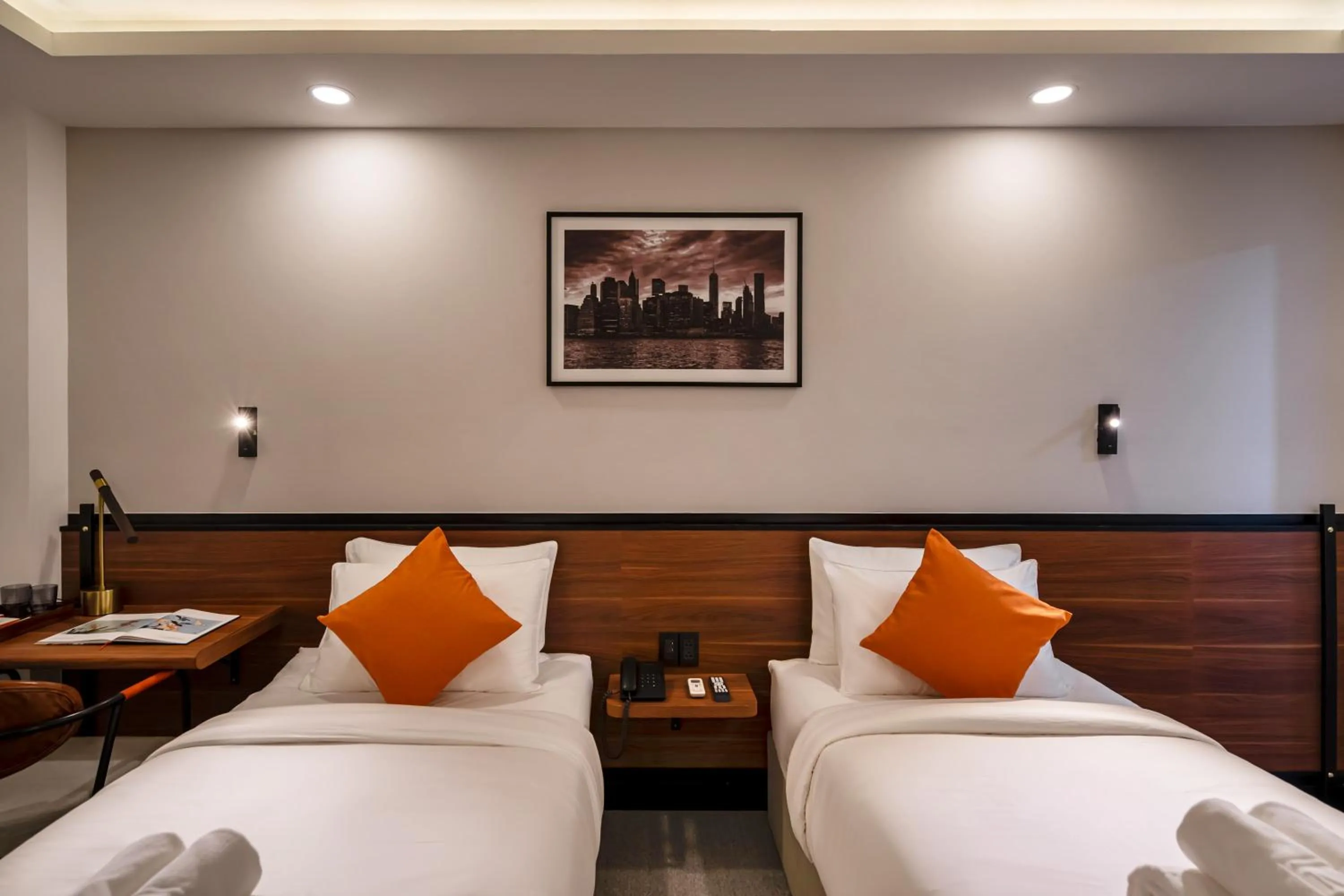 Bed in Metrolux City Contemporary Hotel