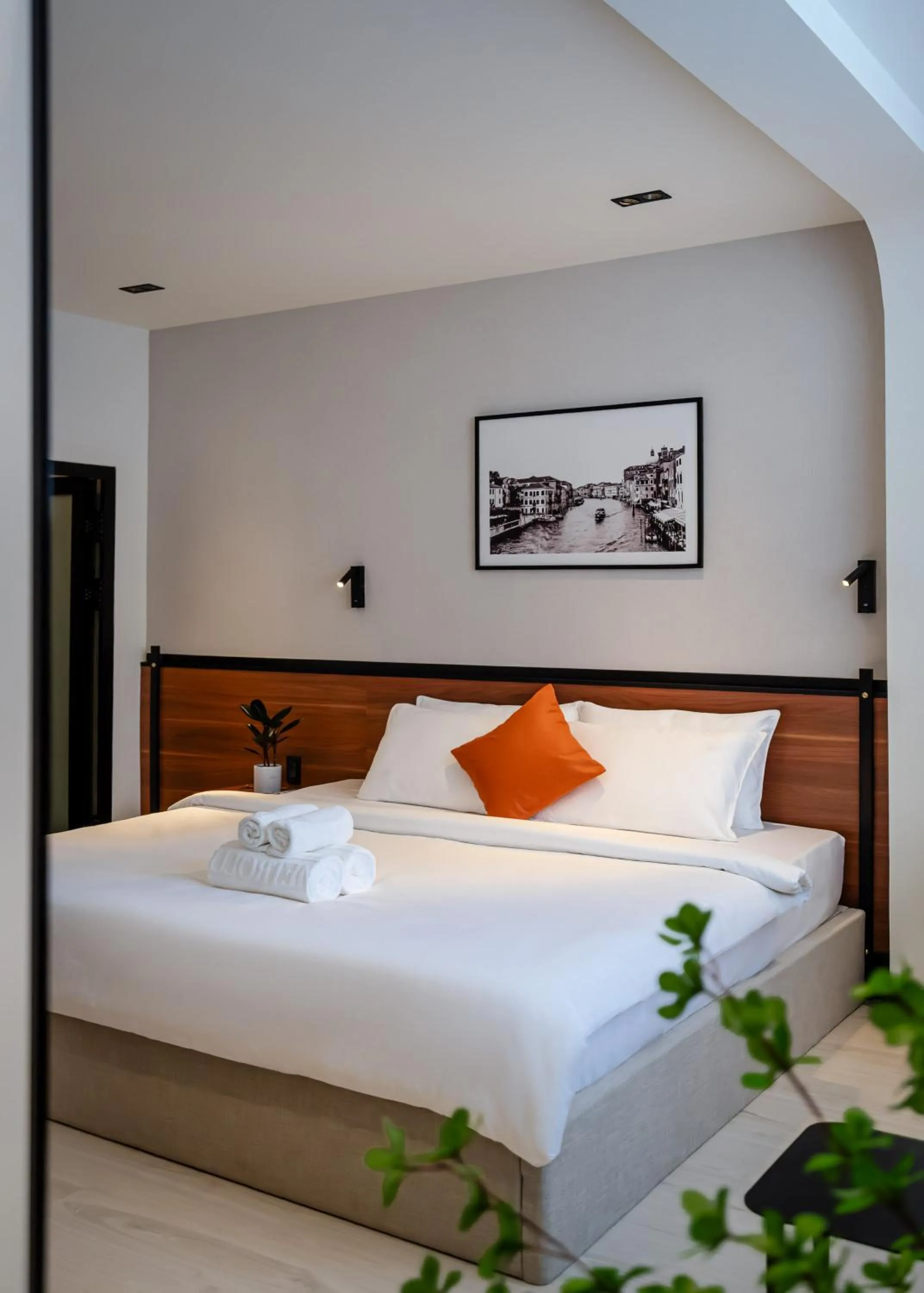 Bed in Metrolux City Contemporary Hotel